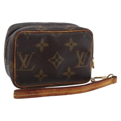 Louis Vuitton Wapity Monogram Canvas Pouch M58030: Louis Vuitton Wapity Monogram Canvas Pouch M58030 This is a Louis Vuitton Monogram Trousse Wapity Pouch, crafted from signature monogram canvas. The pouch shows notable signs of wear, including rubbin