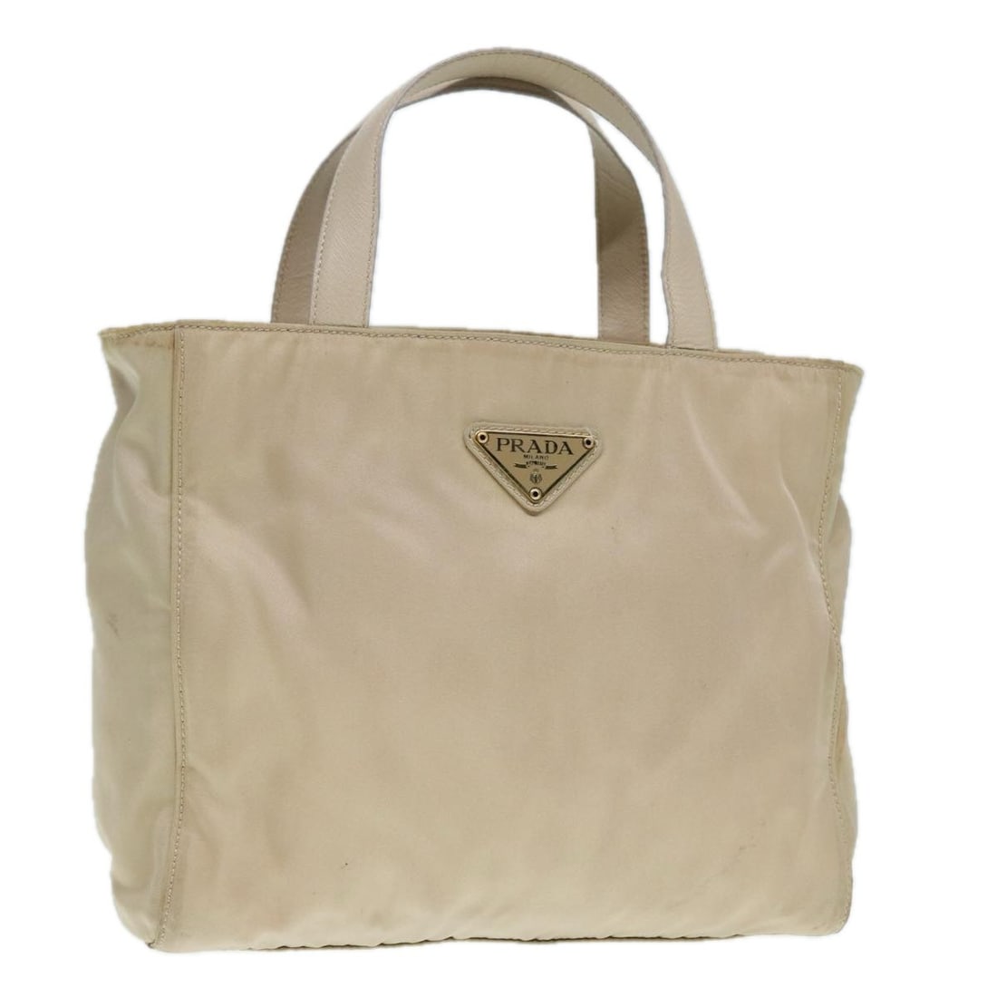 Prada beige nylon women s handbag Italy gold tone: Prada beige nylon women s handbag Italy gold tone This PRADA handbag is crafted from beige and gold nylon and is designed for women. Made in Italy, it features a compact silhouette with a handle drop 