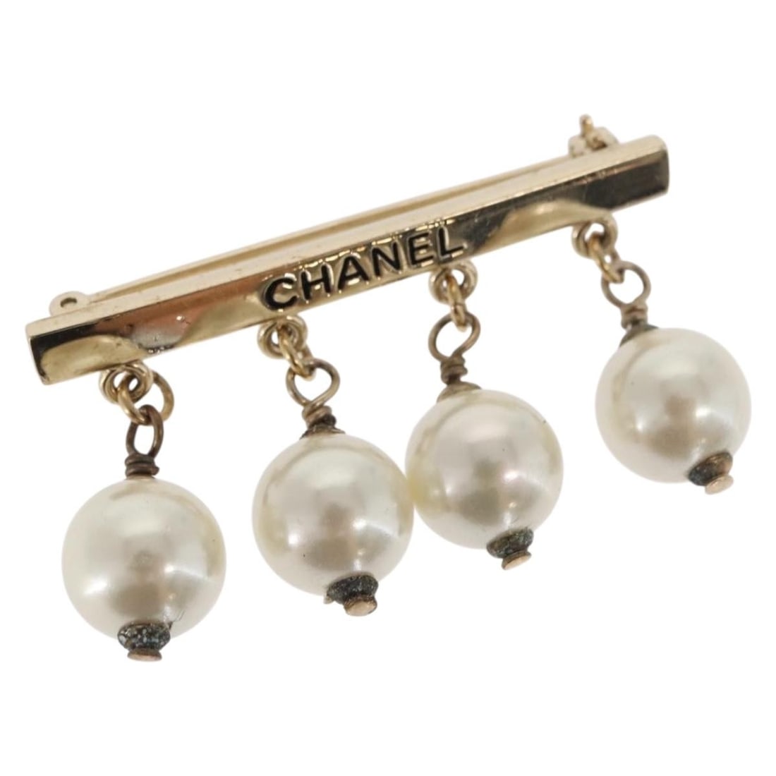 CHANEL Gold Tone CC Pearl Brooch Made in France: CHANEL Gold Tone CC Pearl Brooch Made in France Elevate your accessory collection with this authentic CHANEL Pearl Brooch. Crafted in France, this stunning piece features a gold tone metal finish, exu