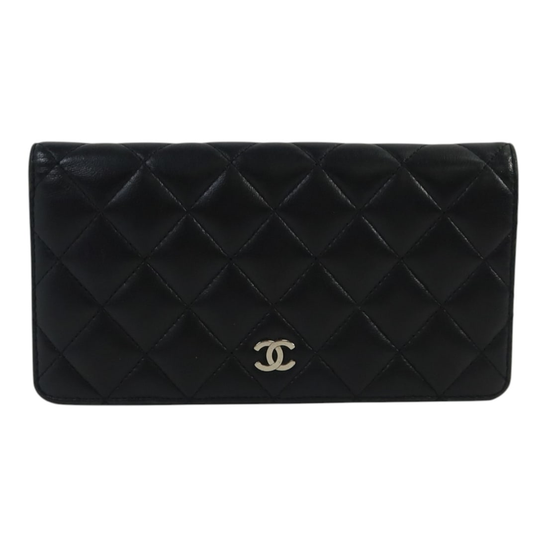 Chanel Black Lambskin Bifold Wallet with Silver CC Logo: Chanel Black Lambskin Bifold Wallet with Silver CC Logo This CHANEL long wallet features a classic bifold design crafted from luxurious black lambskin leather. Designed for women, it offers both elega