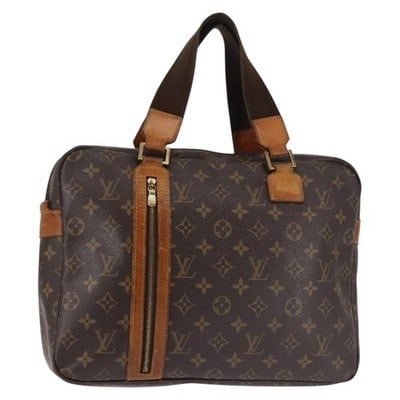 Louis Vuitton Sac Bosphore Monogram Canvas Handbag M40043: Louis Vuitton Sac Bosphore Monogram Canvas Handbag M40043 This is a Louis Vuitton Monogram Sac Bosphore handbag, crafted from signature monogram canvas and made in Spain. The bag features a spacious i