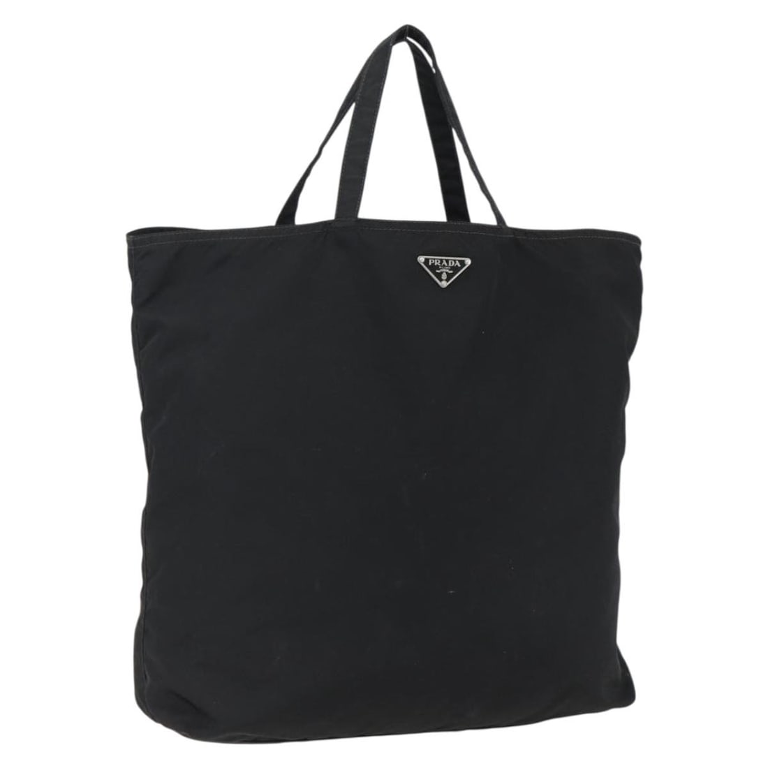 Prada black nylon tote bag made in Italy: Prada black nylon tote bag made in Italy This PRADA tote bag is crafted from black nylon with silver-tone accents and features a spacious design suitable for everyday use. Made in Italy, it offers a h