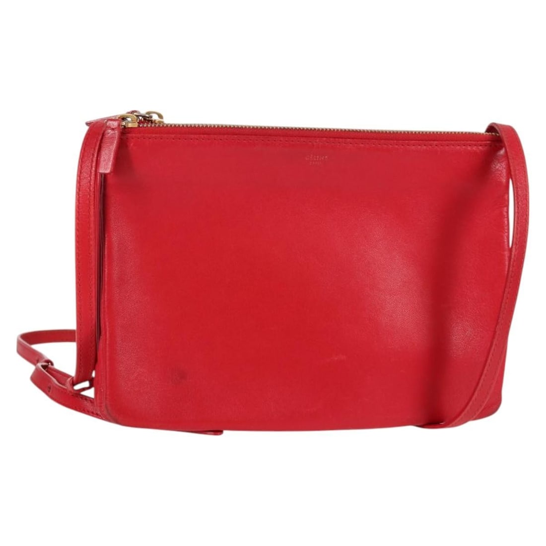 Celine Trio Red Leather Shoulder Bag with Gold Tone Hardware: Celine Trio Red Leather Shoulder Bag with Gold Tone Hardware This is a Celine Trio shoulder bag crafted from red leather with gold-tone accents. The bag is designed for women and features an adjustabl