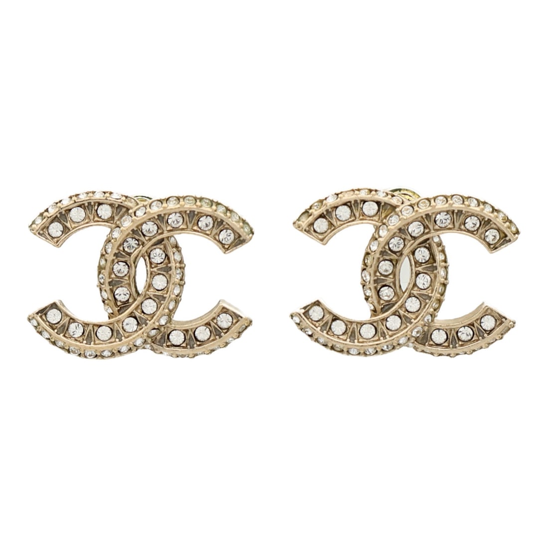 Gold Tone Pierced Earrings with CC Motif by CHANEL: Gold Tone Pierced Earrings with CC Motif by CHANEL These CHANEL CC pierced earrings feature a gold-tone finish and are crafted from unspecified metal. Designed in a regular size and made in France, th