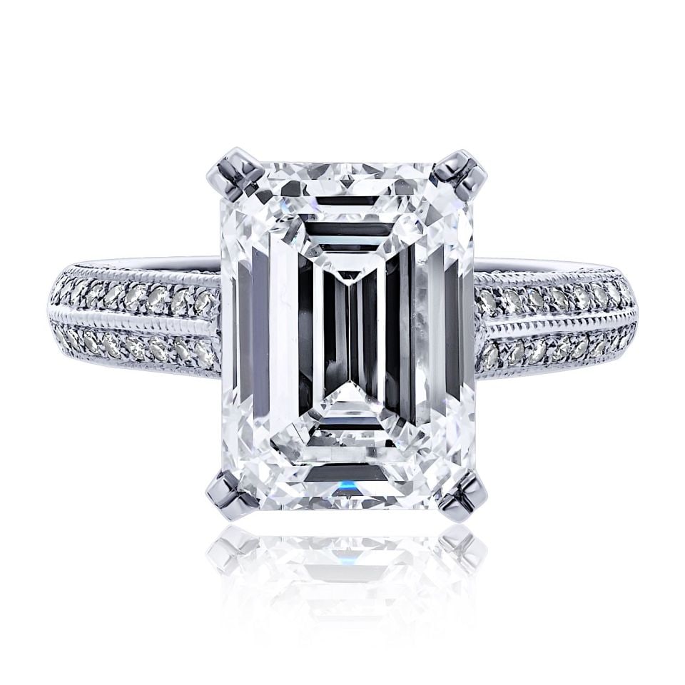 Platinum 5.04 Carat GIA Emerald Cut Diamond Engagement Ring: Platinum 5.04 Carat GIA Emerald Cut Diamond Engagement Ring This exquisite engagement ring is crafted from platinum and features a stunning 5.04 carat emerald cut diamond with GIA certification, showc