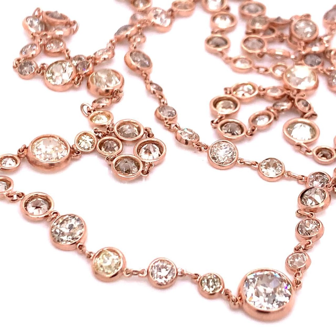 18K Rose Gold 42.40 Ct. Diamond by the Yard Necklace 174 Diamonds: 18K Rose Gold 42.40 Ct. Diamond by the Yard Necklace 174 Diamonds This exquisite 42.40 Ct. Diamond by the Yard Necklace features a stunning array of 174 diamonds set in luxurious 18K rose gold. Weighi