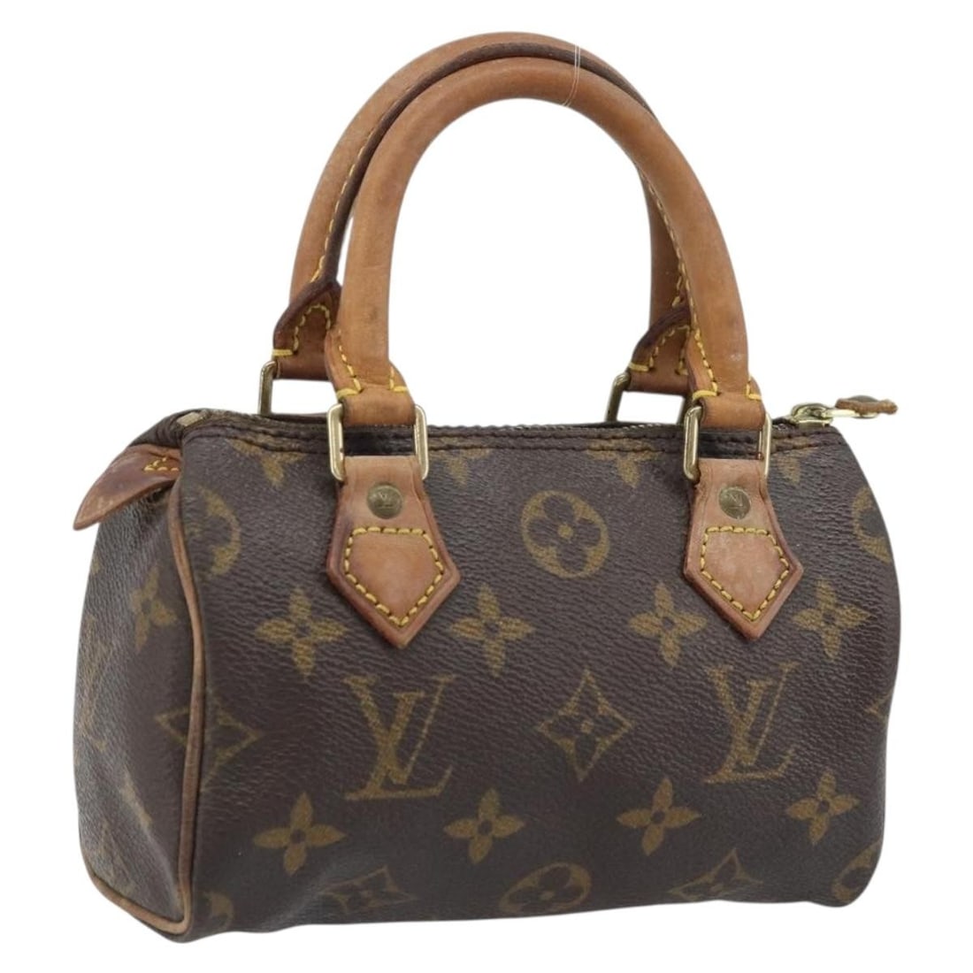 Mini Speedy Monogram Canvas Handbag by Louis Vuitton M41534: Mini Speedy Monogram Canvas Handbag by Louis Vuitton M41534 This Louis Vuitton Monogram Mini Speedy Hand Bag, model M41534, is crafted from signature Monogram canvas with natural leather trim. The bag