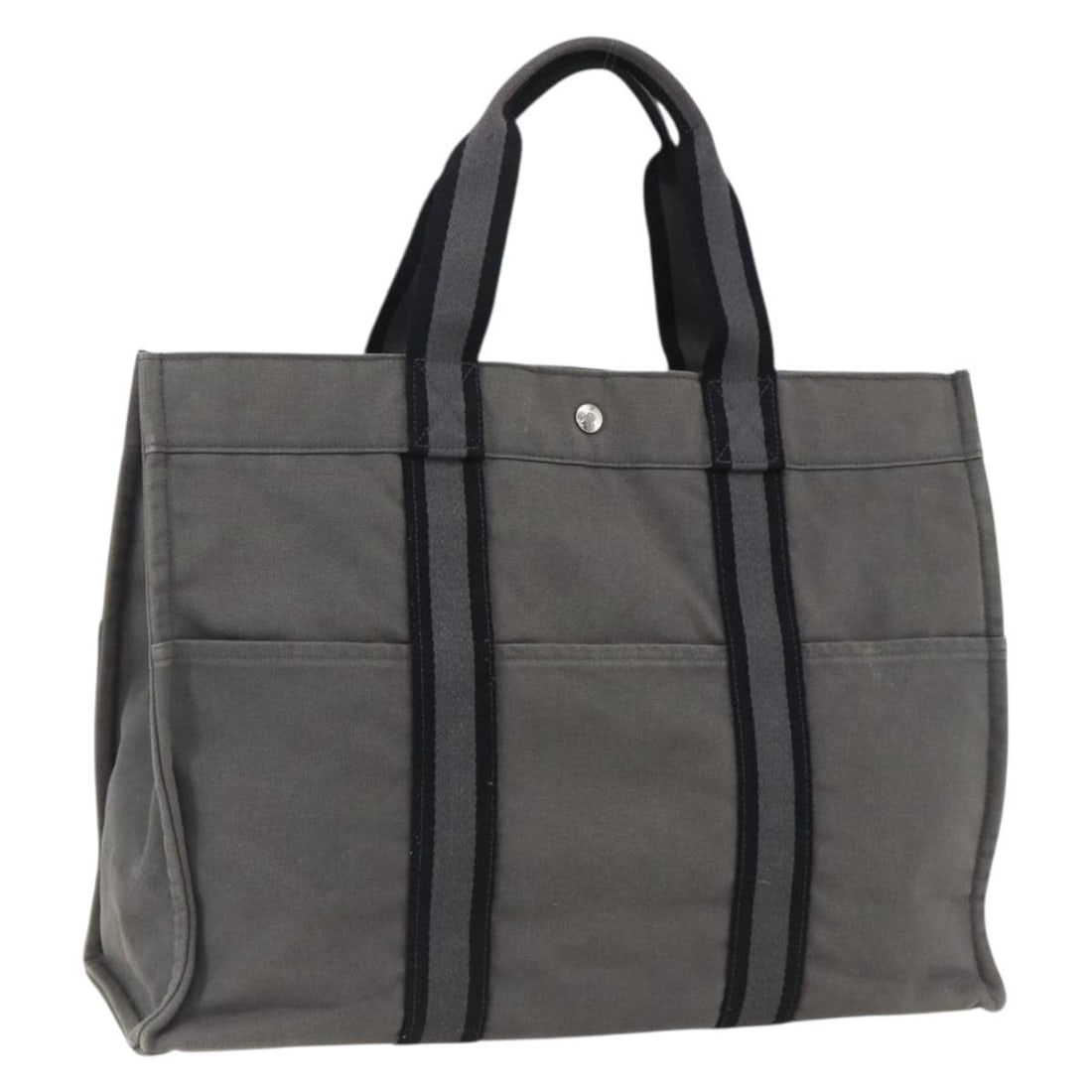 Hermes Fourre Tout GM Canvas Gray Silver Tote Bag: Hermes Fourre Tout GM Canvas Gray Silver Tote Bag This Hermes Fourre Tout GM hand bag is crafted from durable gray and silver canvas. Designed for women, it features a spacious interior with practical