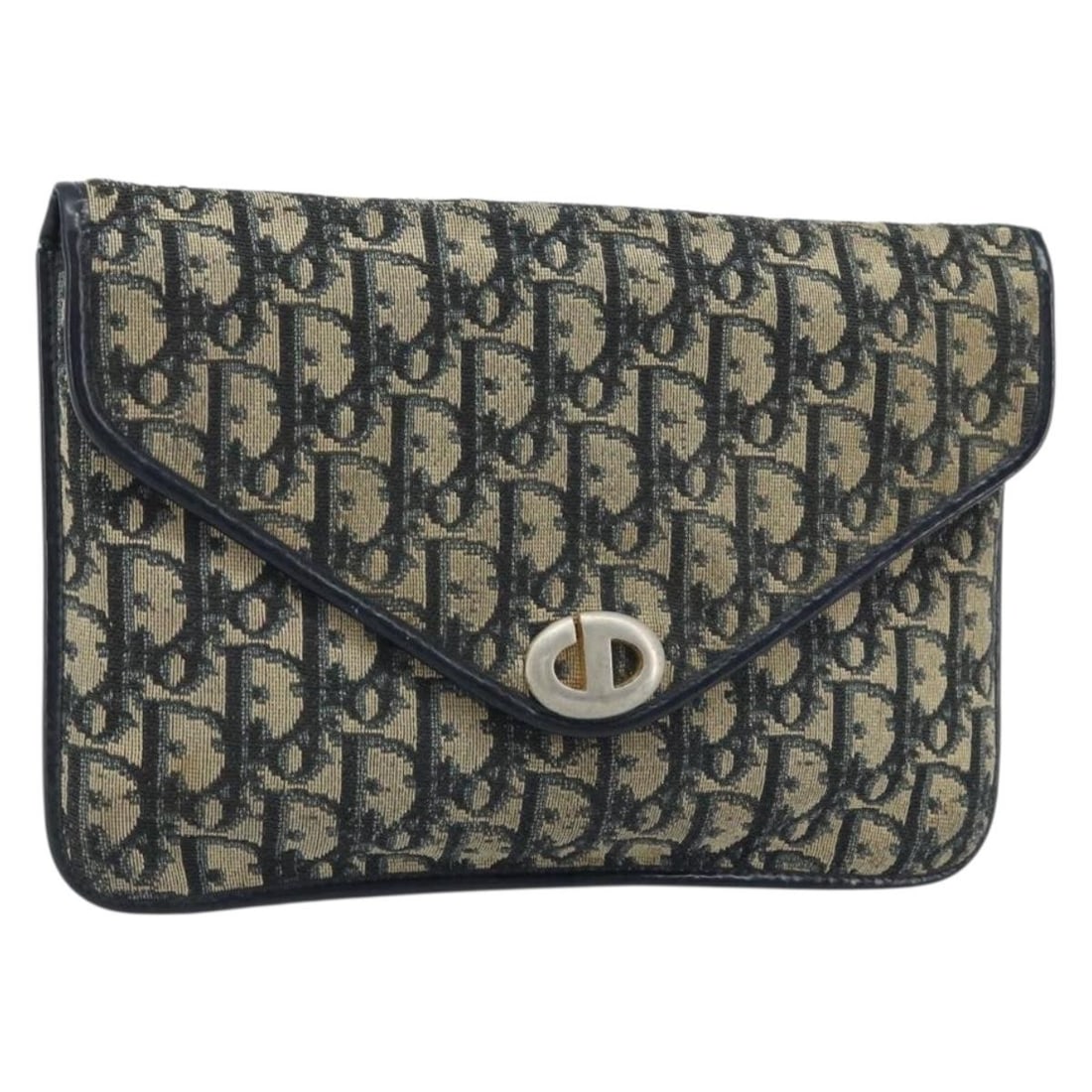 Navy Gold Trotter Canvas Clutch by Christian Dior France: Navy Gold Trotter Canvas Clutch by Christian Dior France This Christian Dior clutch bag features the iconic Trotter canvas in navy and gold tones. Designed for women, it has a classic envelope style w