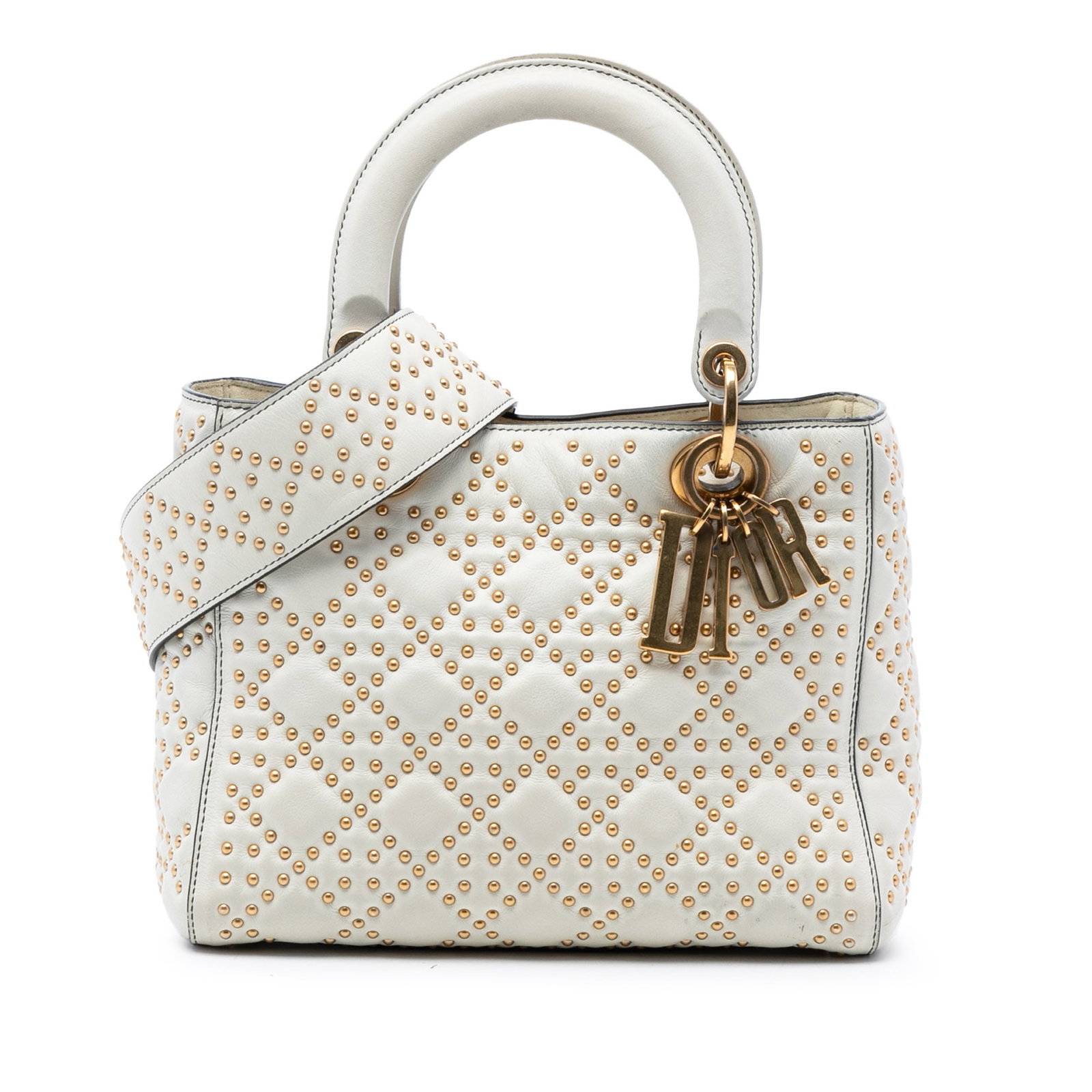 Dior Lady Dior Medium White Studded Lambskin Satchel with Detachable Strap: Dior Lady Dior Medium White Studded Lambskin Satchel with Detachable Strap This Dior Medium Lambskin Cannage Studded Supple Lady Dior satchel features a studded leather body in white with flat handles