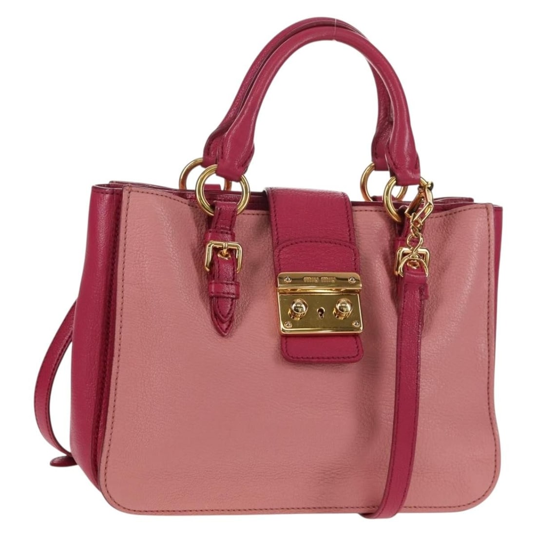 Pink Leather Madras Convertible Lock Tote by Miu Miu: Pink Leather Madras Convertible Lock Tote by Miu Miu This pre-owned Miu Miu Madras Convertible Lock Tote is crafted from pink leather and features a secure lock closure. Designed for women, the tote i