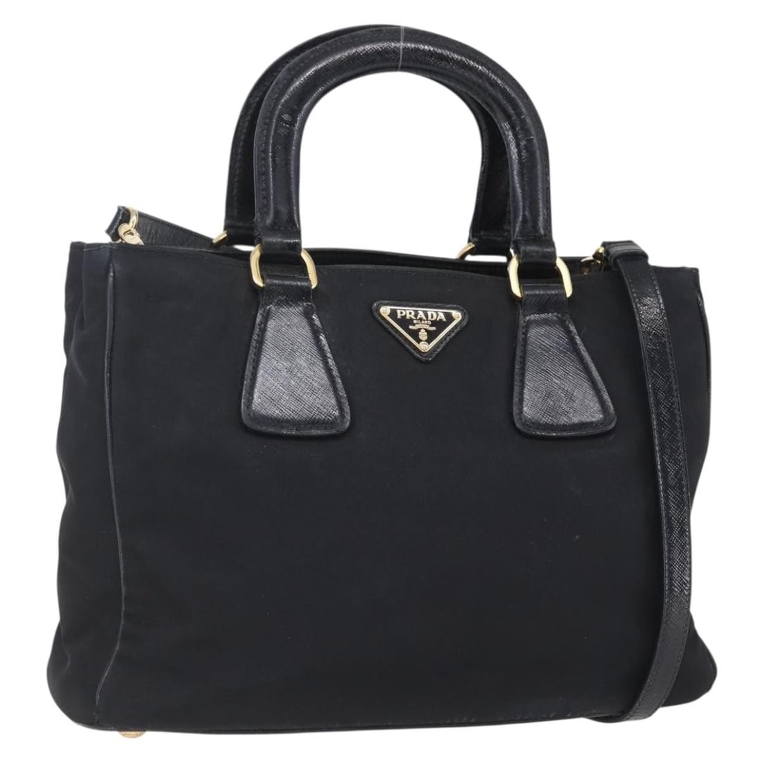 Prada nylon black silver shoulder bag with strap: Prada nylon black silver shoulder bag with strap This PRADA 2-way handbag is crafted from durable black nylon with silver-tone accents. Designed for versatility, it can be carried by hand or worn over