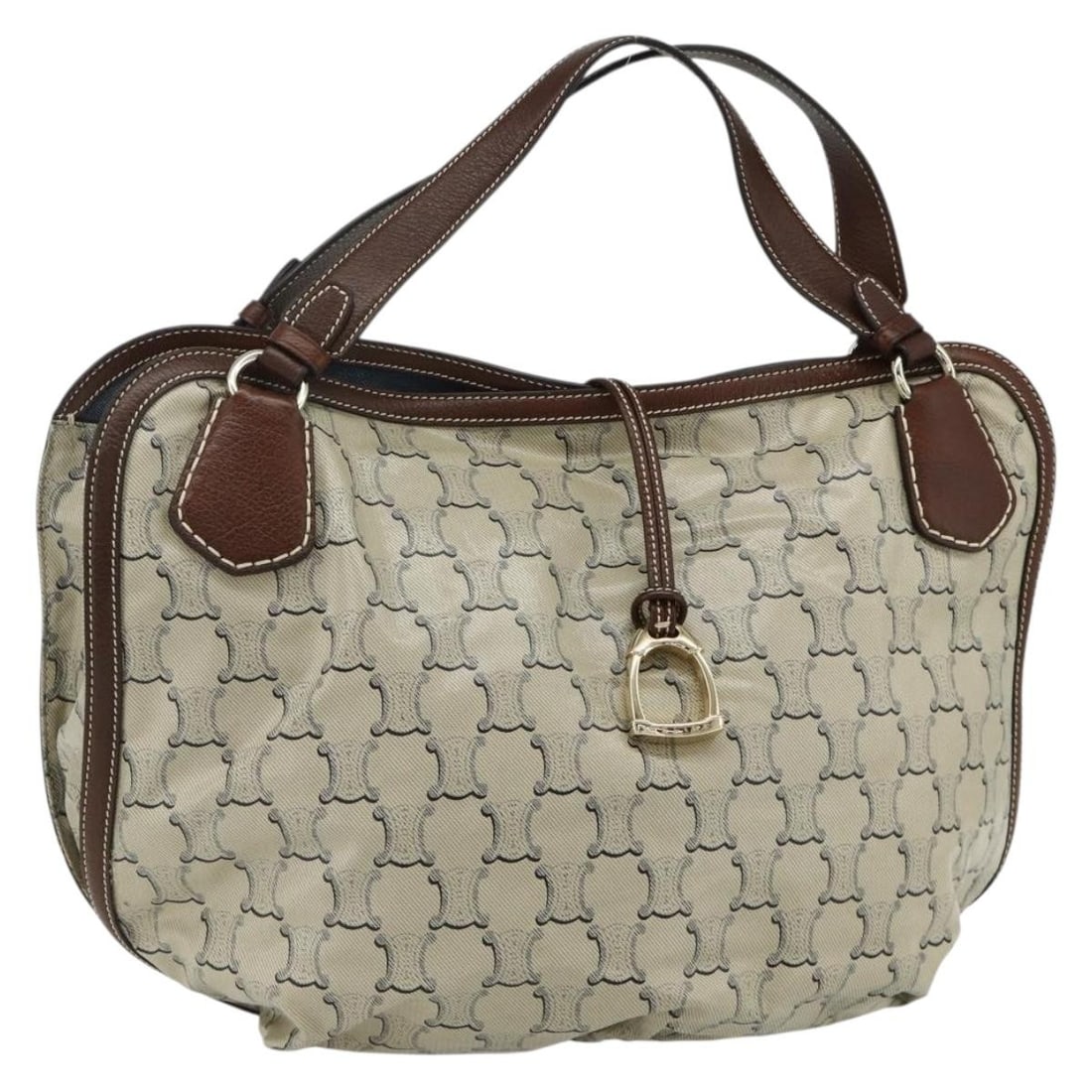 CELINE Macadam Beige Gold Coated Canvas Handbag Italy: CELINE Macadam Beige Gold Coated Canvas Handbag Italy This CELINE Macadam Canvas Bittersweet hand bag is crafted from durable coated canvas in a beige and gold color scheme. Designed for women, the ba