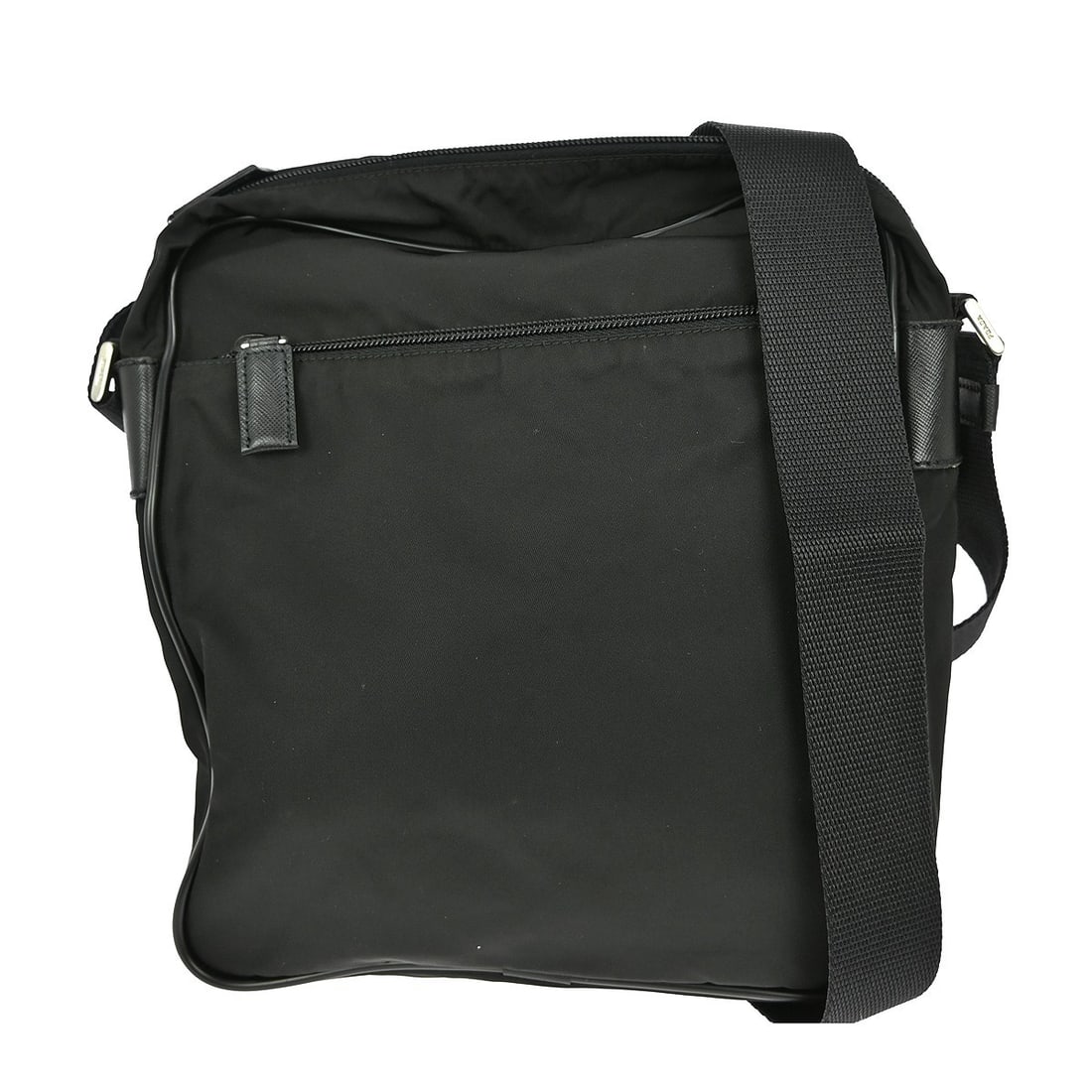 Prada Nylon Crossbody Bag Black Medium Italy: Prada Nylon Crossbody Bag Black Medium Italy This Prada crossbody bag is crafted from black nylon and features a medium-sized silhouette with a buckle closure. It is designed with a crossbody strap an