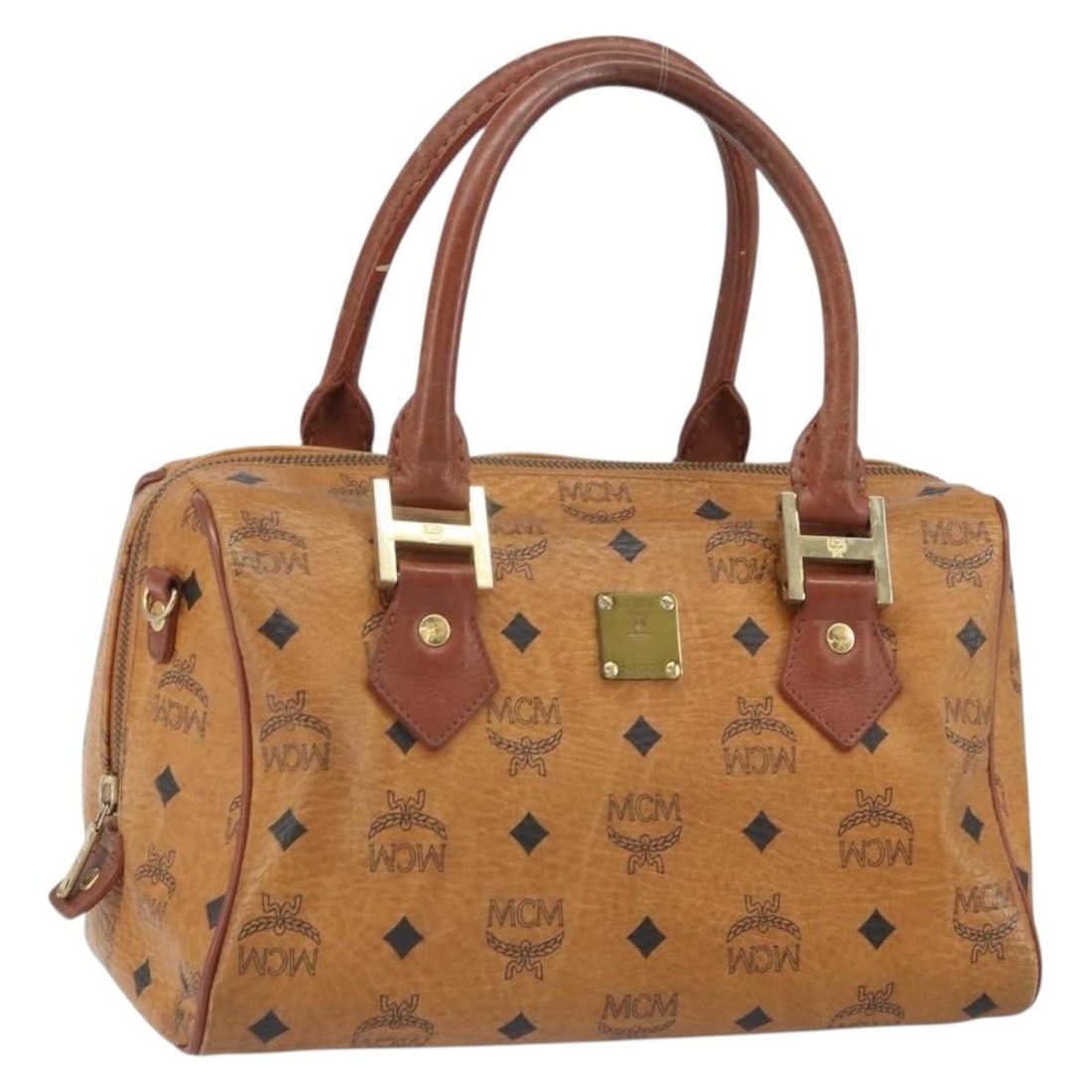 MCM Logogram PVC Leather Brown Handbag Gold Tone Hardware Germany: MCM Logogram PVC Leather Brown Handbag Gold Tone Hardware Germany This MCM Vicetos Logogram handbag features a brown and gold PVC leather exterior with gold-tone accents. Designed for women, the bag o