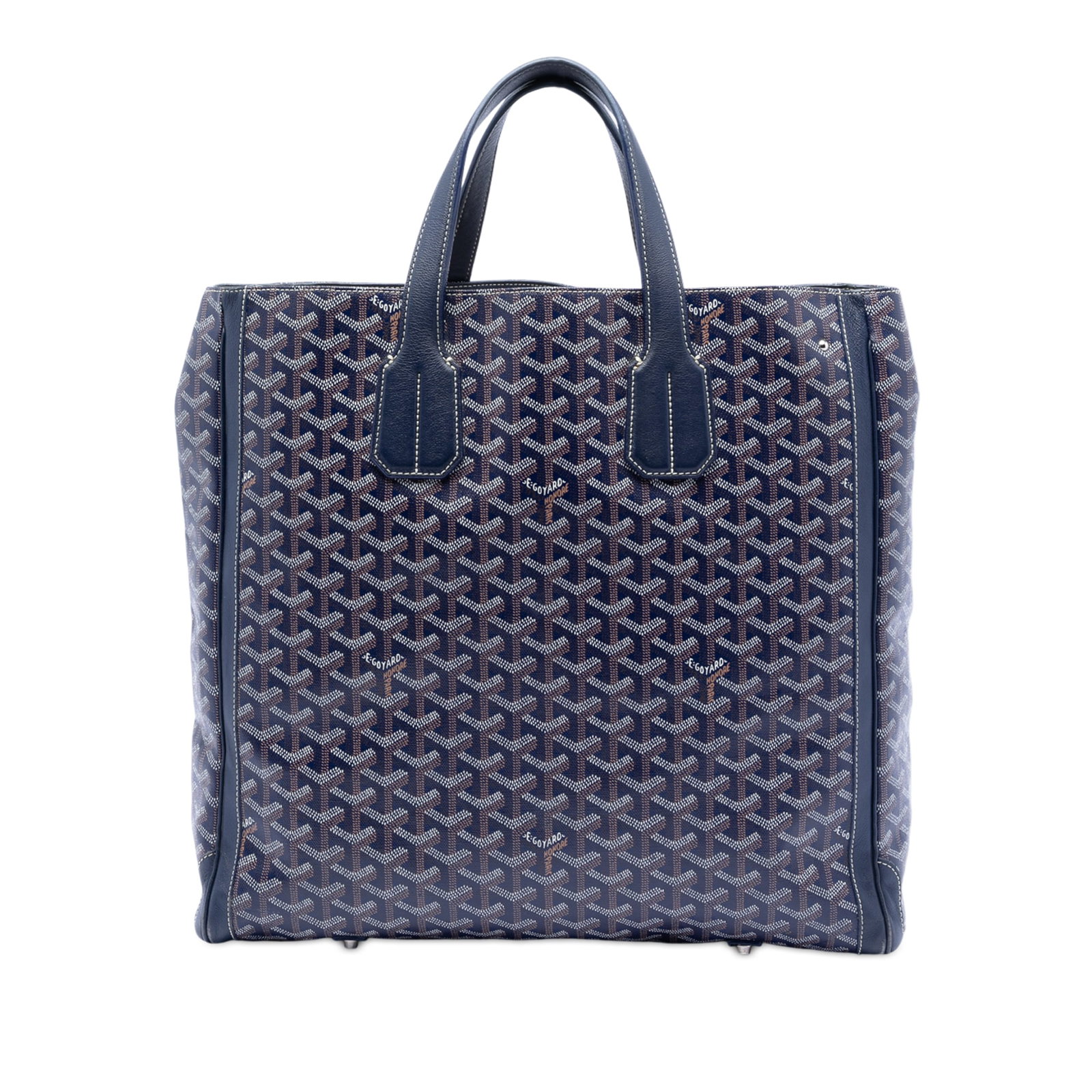 Goyard Goyardine Voltaire Blue Coated Canvas Tote Bag: Goyard Goyardine Voltaire Blue Coated Canvas Tote Bag The Goyardine Voltaire Tote bag features a blue coated canvas body with a flat leather handle and an open top design. The interior includes a slip