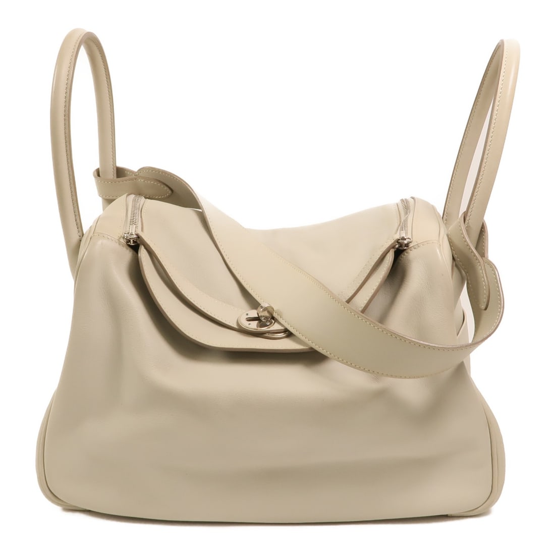Hermes Lindy 34 Gray Calfskin 2way Shoulder Bag: Hermes Lindy 34 Gray Calfskin 2way Shoulder Bag This Hermes Lindy 34 is a versatile 2-way shoulder bag crafted from Veau Swift calfskin leather in a sophisticated Gris Perle (gray) color. Designed for