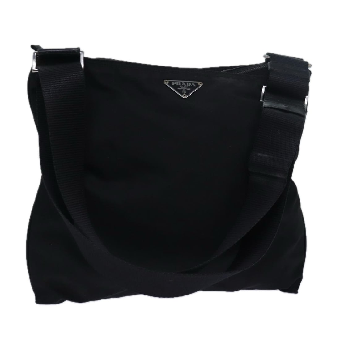 Prada Black Nylon Women Shoulder Bag Italy: Prada Black Nylon Women Shoulder Bag Italy This PRADA shoulder bag is crafted from black nylon and features an adjustable shoulder strap. Designed for women, the bag offers a spacious interior and a v