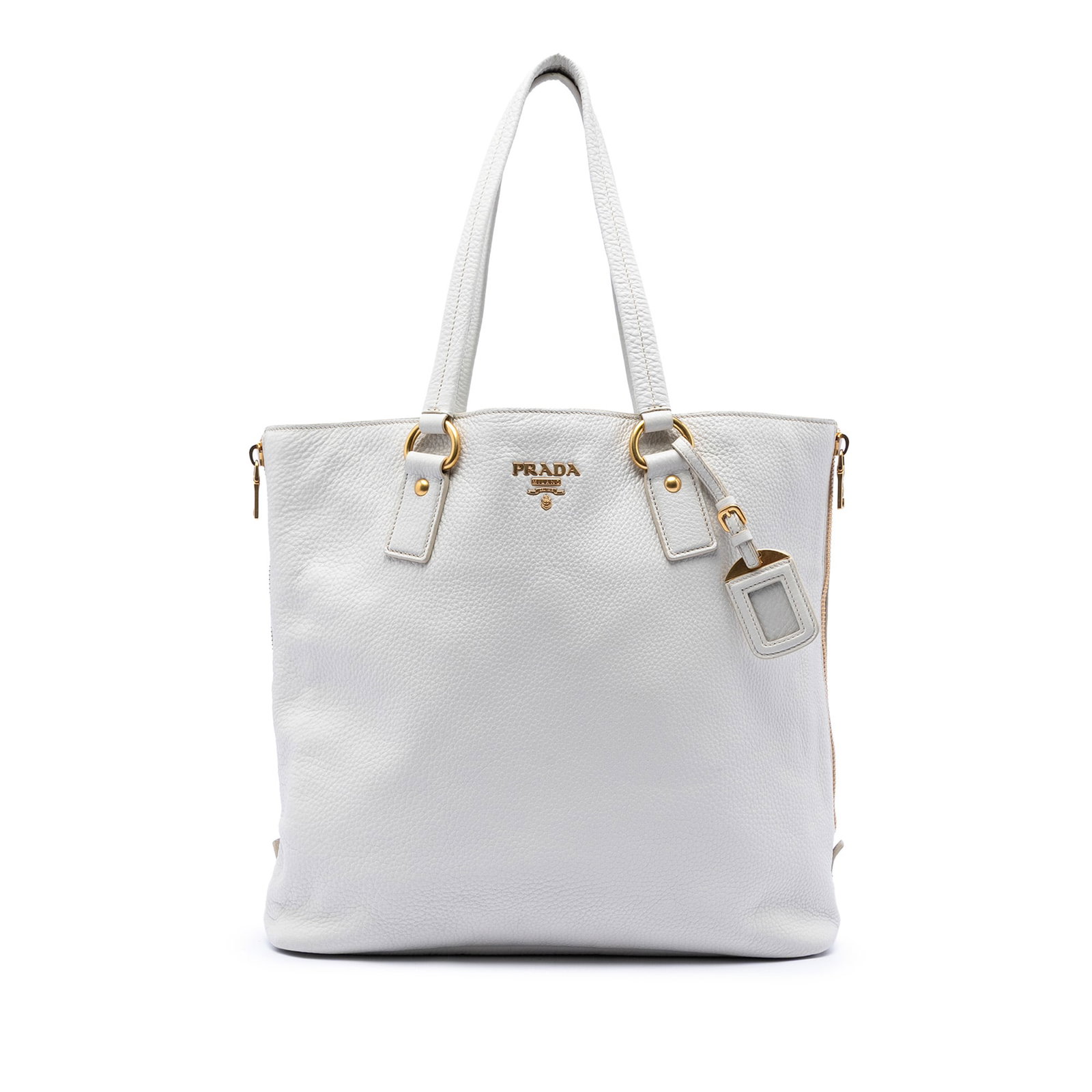 White Leather Tote with Side Zippers Vitello Daino by Prada: White Leather Tote with Side Zippers Vitello Daino by Prada This Prada Vitello Daino Side Zip Tote features a white leather body with flat leather handles and exterior side zip expansion. The open top
