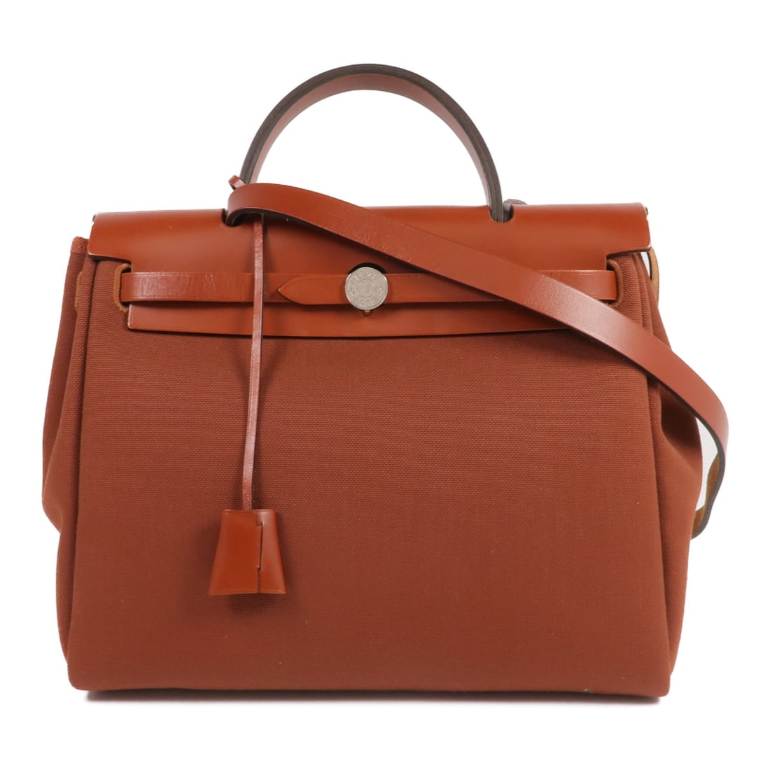 Herbag PM Canvas Shoulder Bag Red 2Way by Hermes: Herbag PM Canvas Shoulder Bag Red 2Way by Hermes This Hermes Herbag PM is a 2-way shoulder handbag crafted from durable canvas in a striking red hue. It offers versatile carrying options and features 