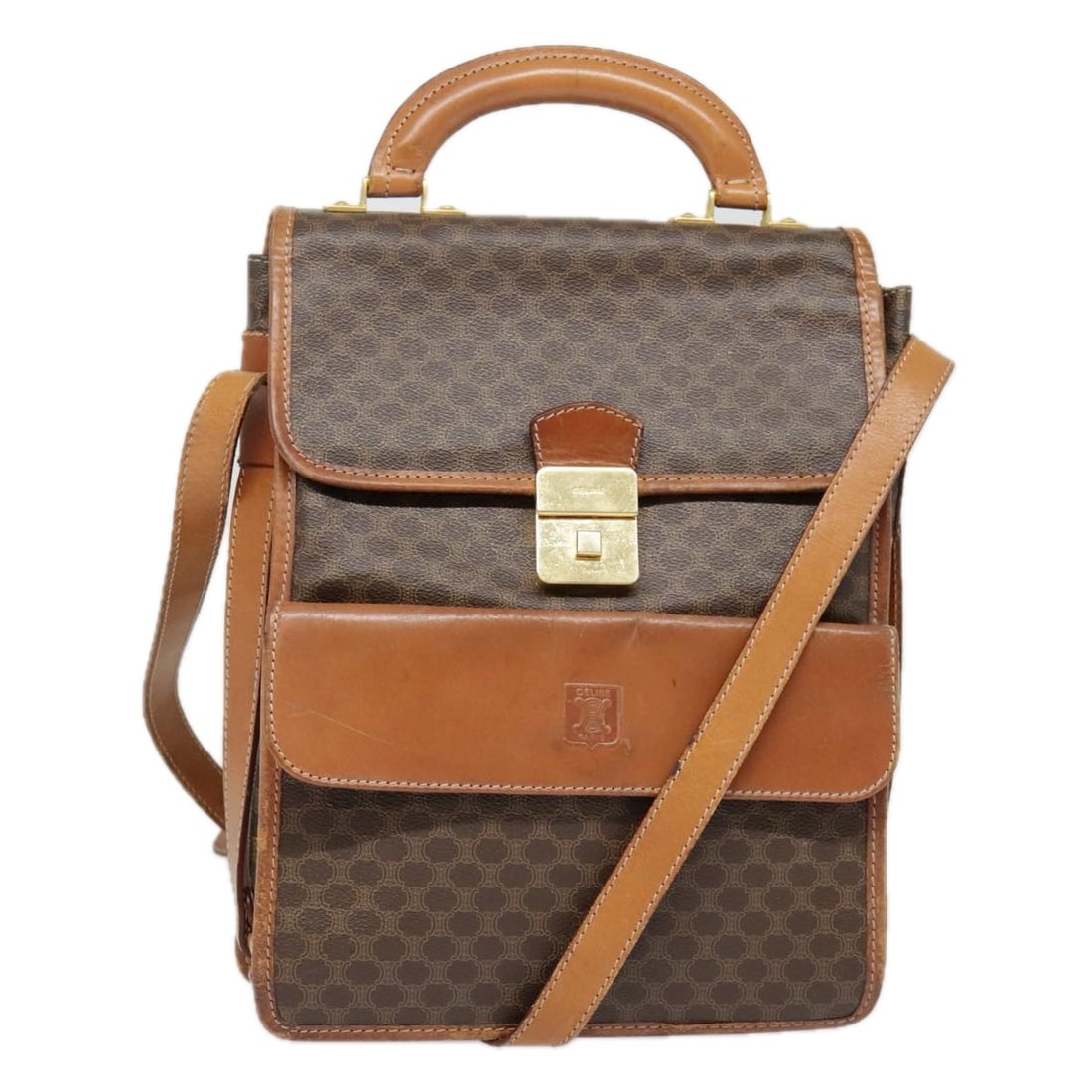 Celine Macadam Brown Shoulder Bag in PVC Leather Gold Accents Italy: Celine Macadam Brown Shoulder Bag in PVC Leather Gold Accents Italy This Celine Macadam shoulder bag is crafted from brown and gold PVC leather with Macadam canvas accents. Designed for women, it feat