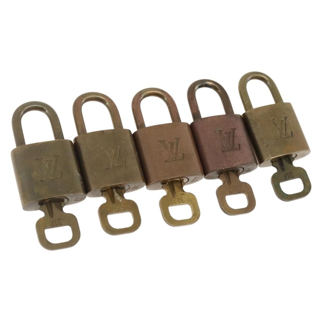 Set of 5 Gold Metal Padlocks by Louis Vuitton France: Set of 5 Gold Metal Padlocks by Louis Vuitton France This is a set of five Louis Vuitton padlocks in gold-tone metal, crafted in France. The set is designed for women and features a heavily used condi