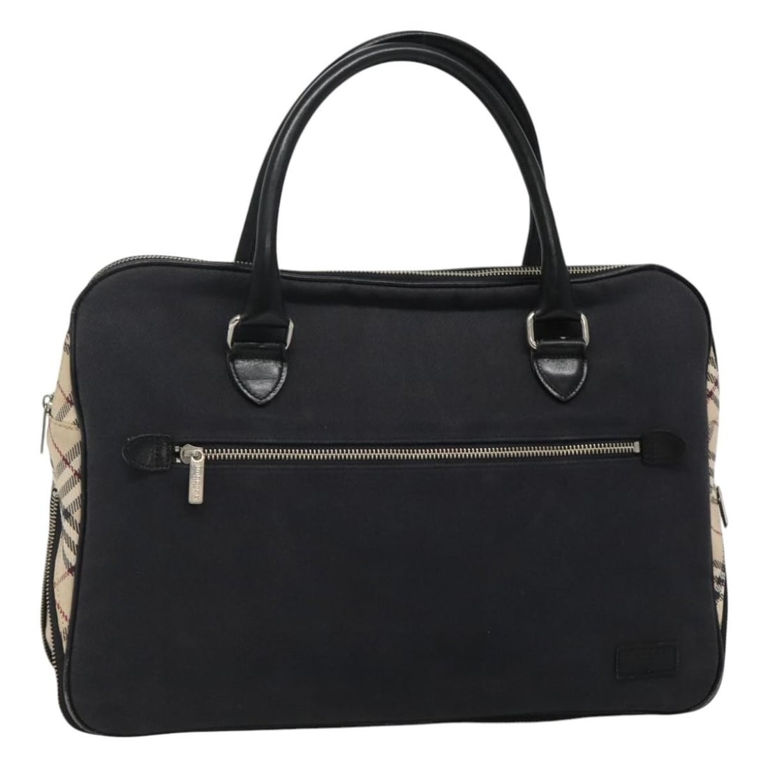 Navy Canvas Blue Label Handbag by Burberry for Women: Navy Canvas Blue Label Handbag by Burberry for Women This Burberry Blue Label handbag is crafted from navy canvas and designed for women. It features a spacious interior and a simple, classic silhouet
