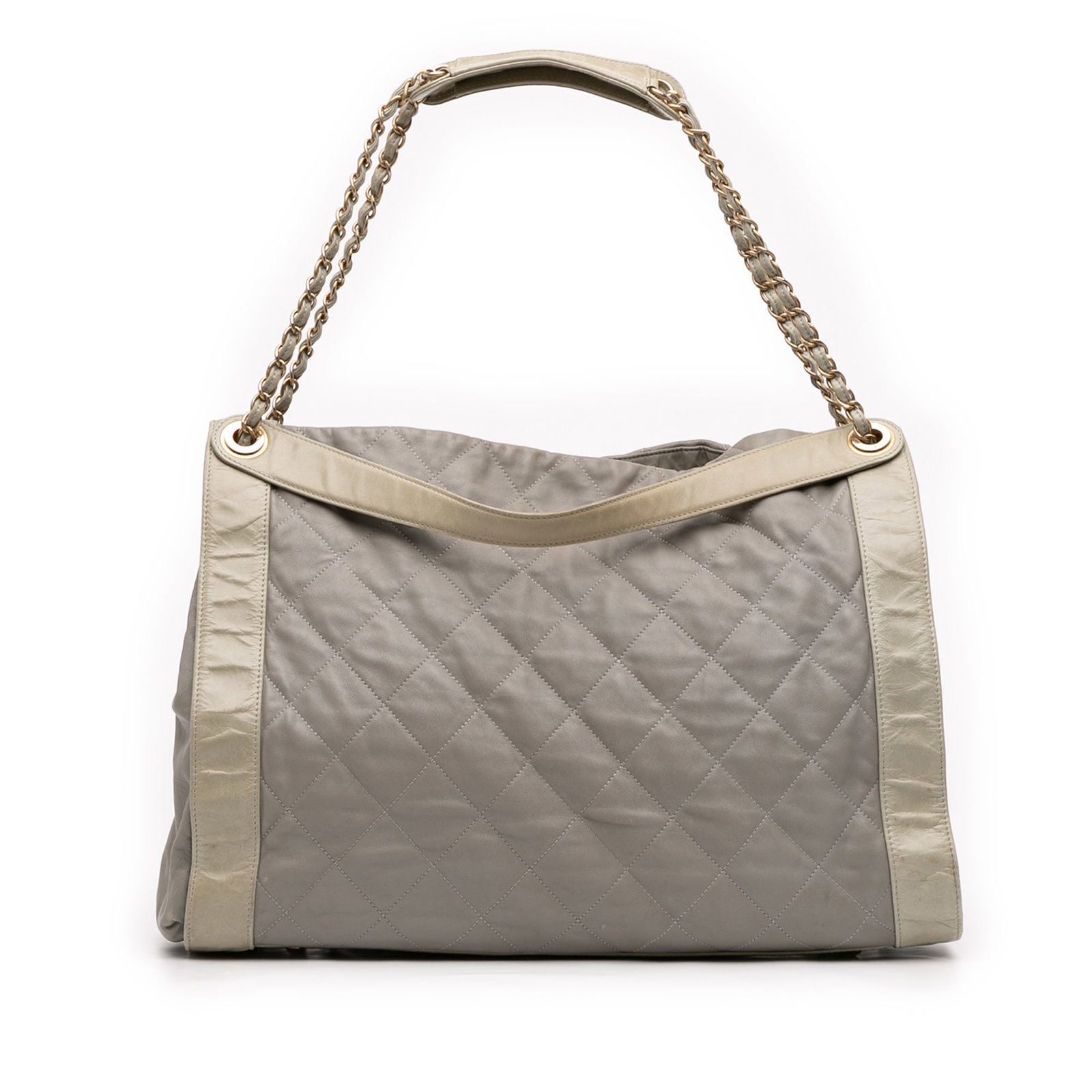 Chanel In The Mix Gray Quilted Lambskin Leather Tote Bag: Chanel In The Mix Gray Quilted Lambskin Leather Tote Bag This Chanel Quilted Lambskin In The Mix Tote is crafted from quilted lambskin leather in gray and features flat leather handles, leather-woven 