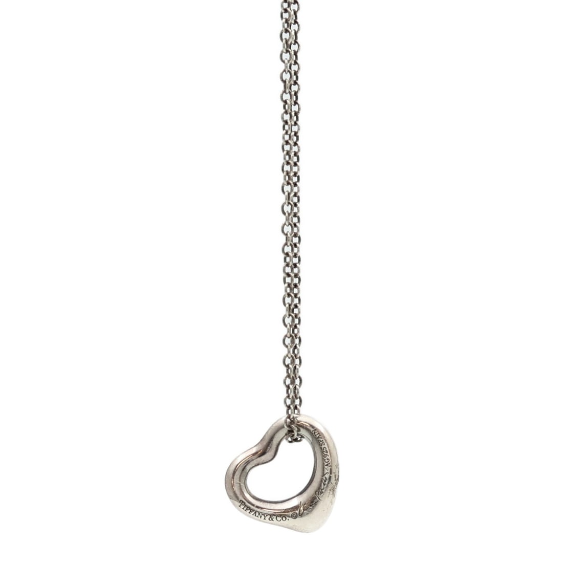 Silver 925 Open Heart Pendant Necklace by Tiffany and Co: Silver 925 Open Heart Pendant Necklace by Tiffany and Co This Tiffany & Co. Open Heart necklace is crafted from 925 silver and features a sleek, minimalist design without a main stone. Made in the Uni