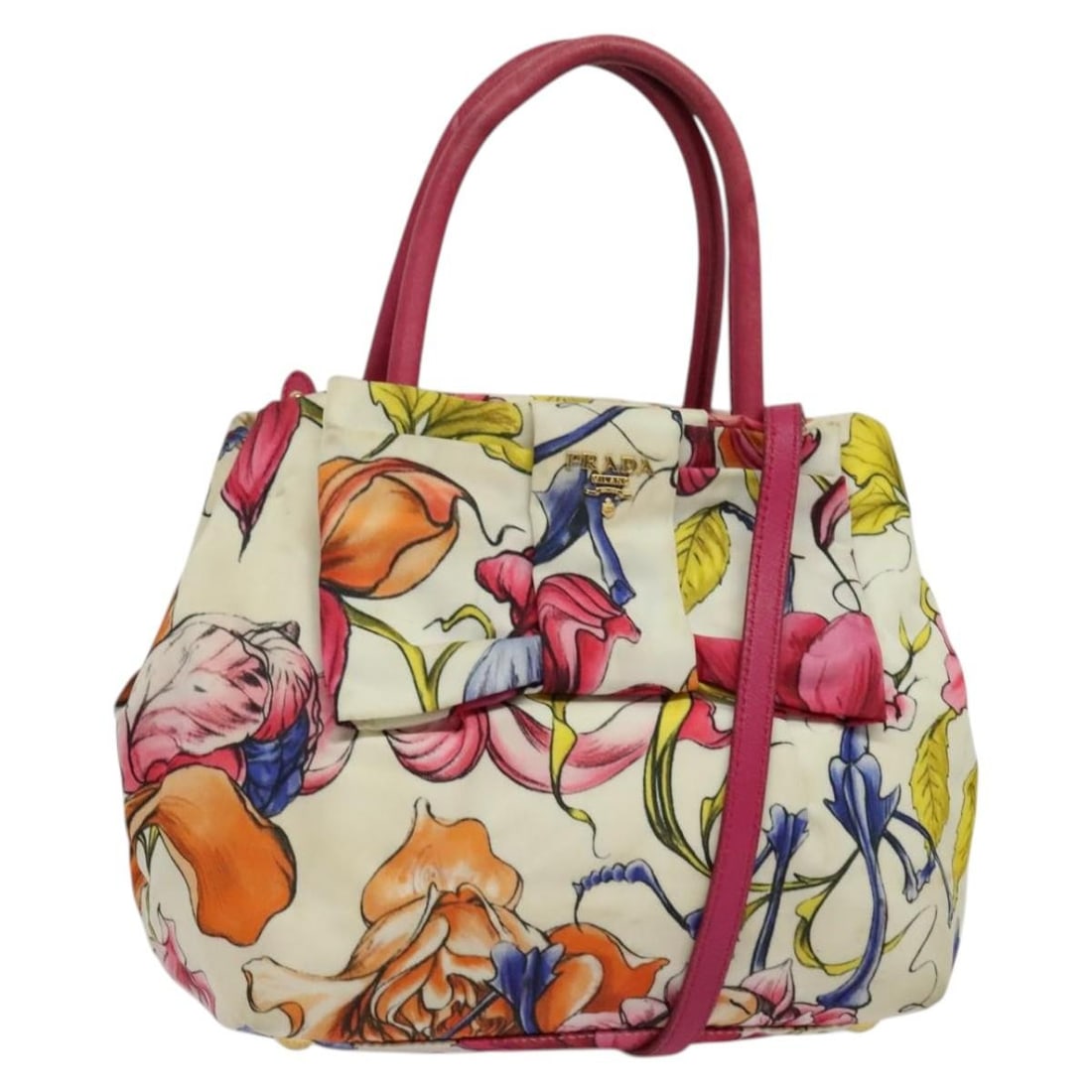 Prada white nylon handbag with shoulder strap and card: Prada white nylon handbag with shoulder strap and card This PRADA 2-way handbag is crafted from durable nylon in a white and gold color combination. Designed for versatility, it can be carried by hand