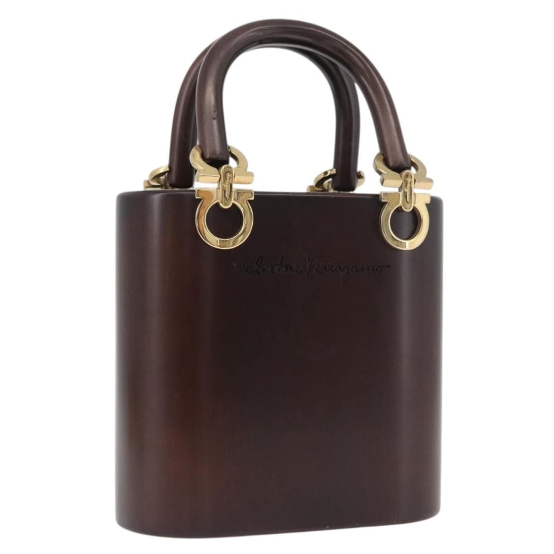 Gancini Wood Brown Gold Handbag by Salvatore Ferragamo Italy: Gancini Wood Brown Gold Handbag by Salvatore Ferragamo Italy This Salvatore Ferragamo Gancini handbag features a unique wood exterior in brown and gold tones. Designed for women, the bag is crafted in