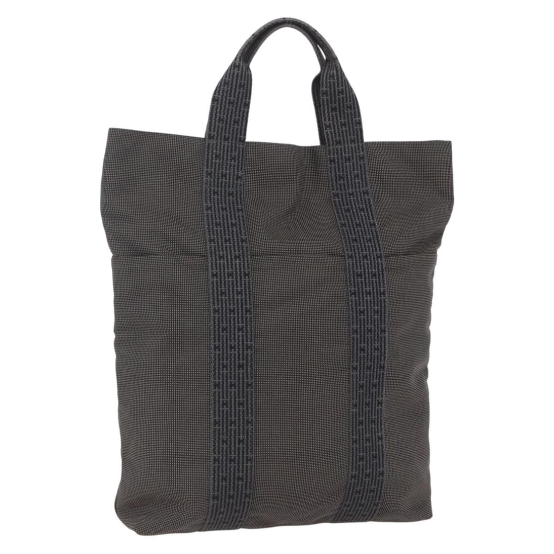 HERMES Her Line MM Canvas Hand Bag Gray Silver Auth: HERMES Her Line MM Canvas Hand Bag Gray Silver Auth This HERMES Her Line MM Hand Bag is a sophisticated accessory crafted in France. Made from durable canvas, it features a stylish gray and silver ext