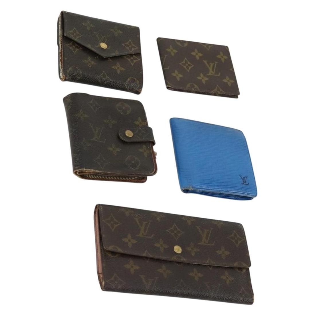 Set of 5 Louis Vuitton Blue Monogram Canvas Wallets France: Set of 5 Louis Vuitton Blue Monogram Canvas Wallets France This is a set of five Louis Vuitton wallets crafted from Monogram Canvas in blue, made in France. The set includes wallets with notable signs