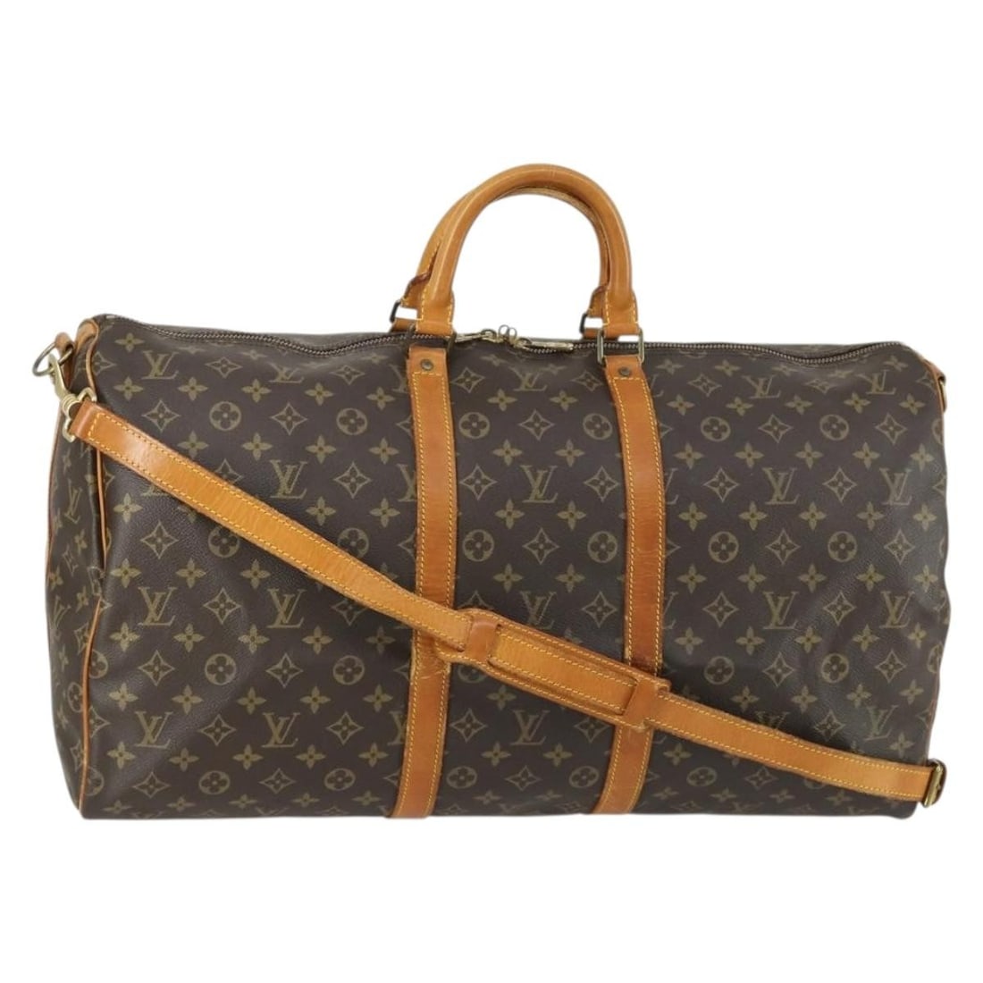 Louis Vuitton Keepall Bandouliere 55 Monogram Canvas Boston Travel Bag M41414: Louis Vuitton Keepall Bandouliere 55 Monogram Canvas Boston Travel Bag M41414 This is a Louis Vuitton Monogram Keepall Bandouliere 55 Boston Bag, crafted from signature monogram canvas. It features a 