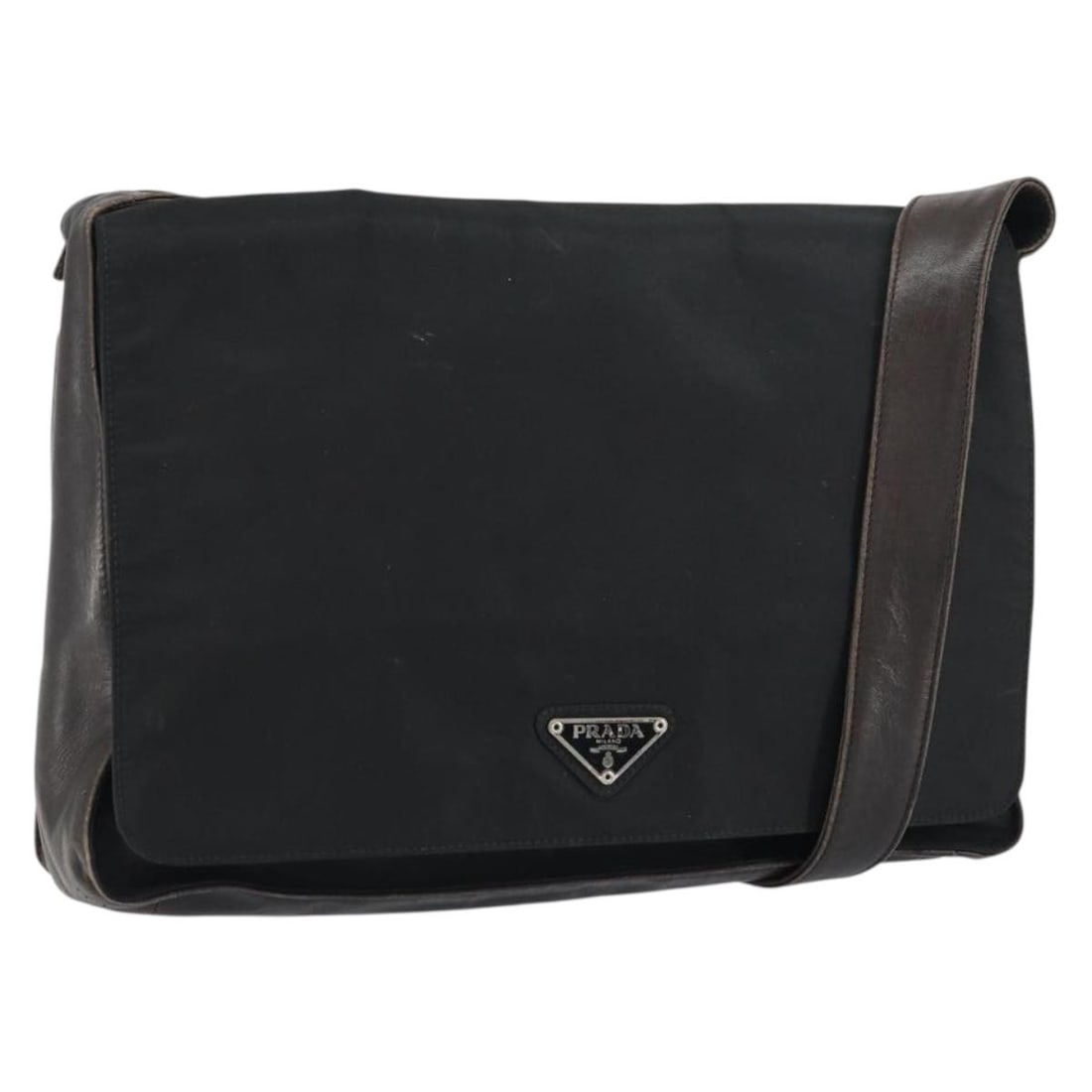 Prada Black Nylon Shoulder Bag Silver Trim Italy: Prada Black Nylon Shoulder Bag Silver Trim Italy This PRADA shoulder bag is crafted from black nylon with silver-tone accents, offering a stylish and practical accessory for everyday use. Made in Ital