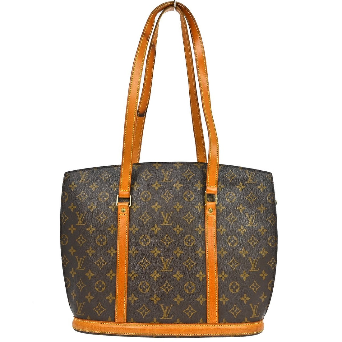 Louis Vuitton Babylone Monogram Canvas Large Tote Handbag M51102: Louis Vuitton Babylone Monogram Canvas Large Tote Handbag M51102 This Louis Vuitton Babylone tote bag features the signature Monogram canvas with beige leather double handles and trim. Designed in a s