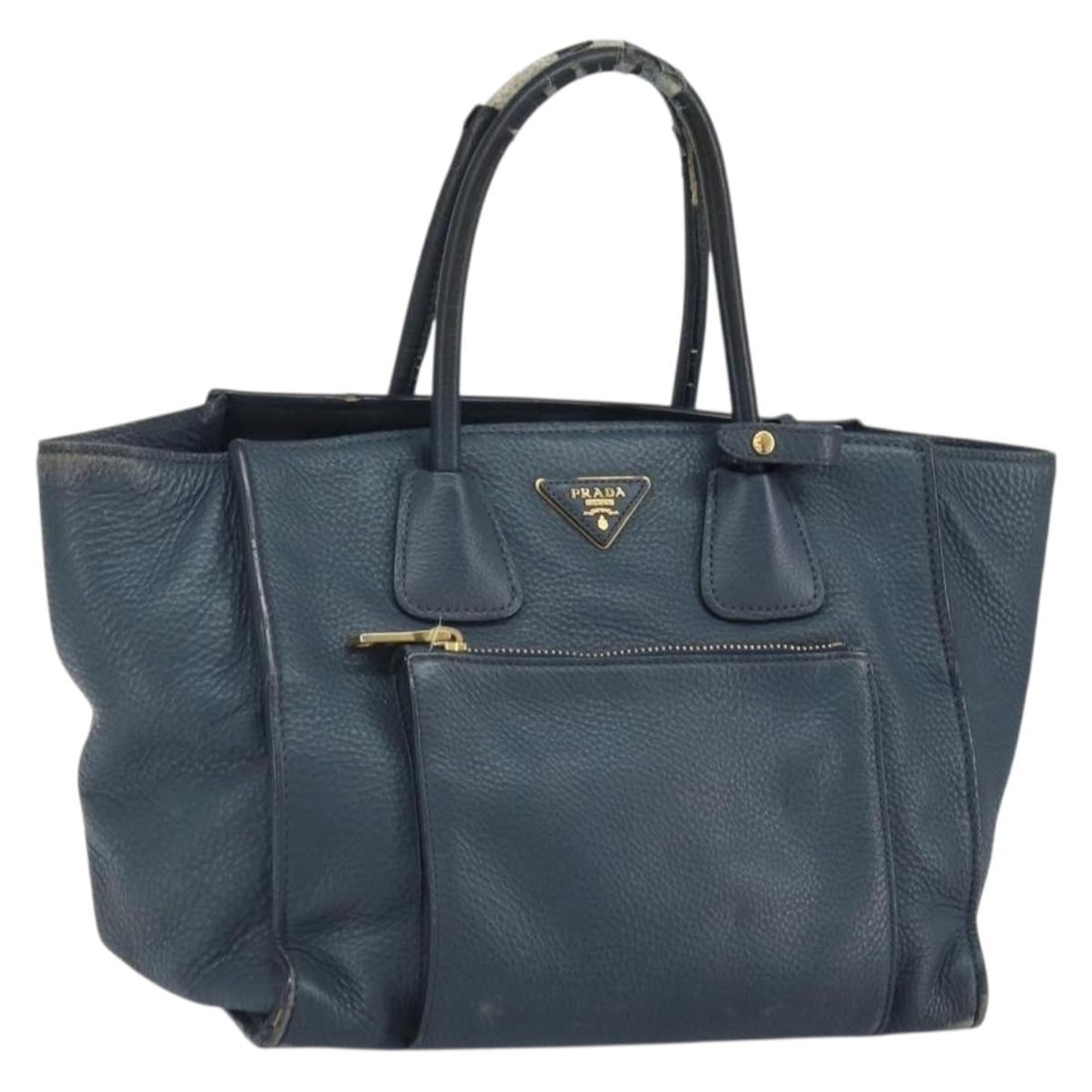 Navy Leather Prada Handbag with Gold Accents Made in Italy: Navy Leather Prada Handbag with Gold Accents Made in Italy This PRADA handbag is crafted from navy leather with gold accents and designed for hand carry. Made in Italy, it features a structured shape 