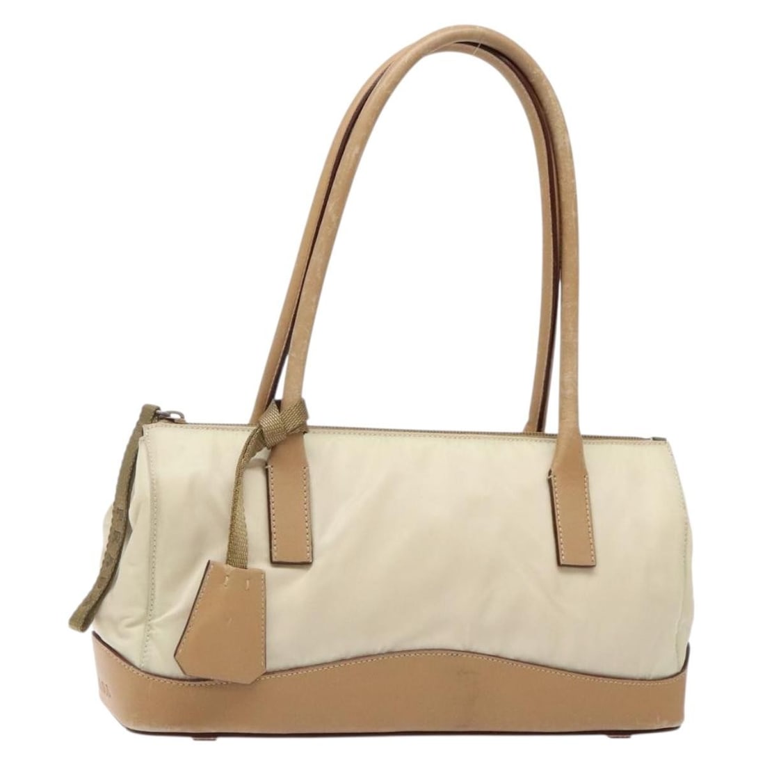 PRADA Beige Nylon Shoulder Bag Made in Italy: PRADA Beige Nylon Shoulder Bag Made in Italy This authentic PRADA shoulder bag is crafted from durable nylon in a chic beige color, making it a versatile accessory for any outfit. Designed with practi