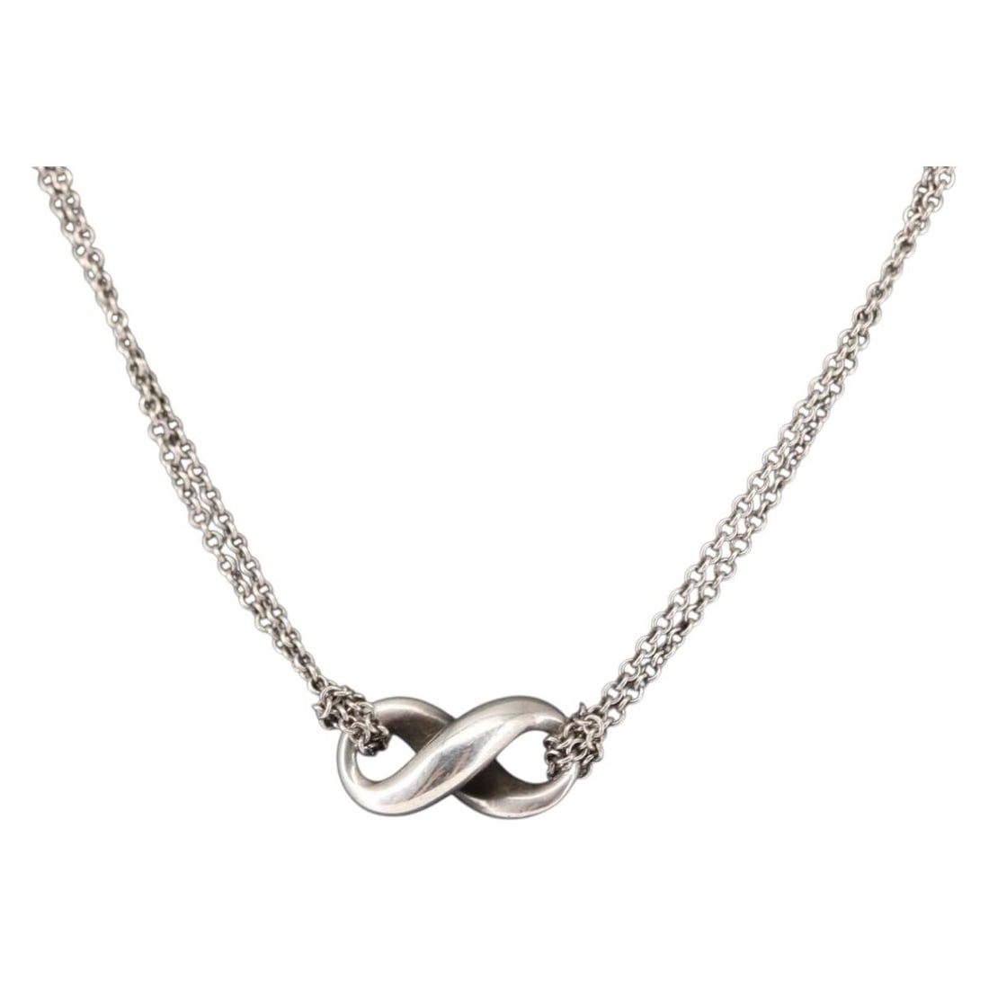 Tiffany & Co. Infinity Necklace Sterling Silver Auth SW1647: Tiffany & Co. Infinity Necklace Sterling Silver Auth SW1647 This stunning Tiffany & Co. Infinity Necklace is crafted from high-quality Ag925 silver, exhibiting a timeless design that symbolizes eterna