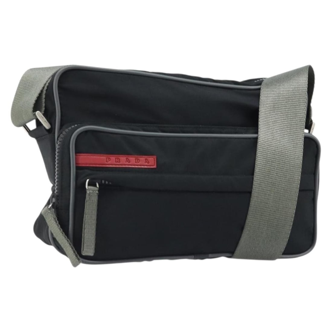 Prada Nylon Sports Shoulder Bag Black Silver Hardware Italy: Prada Nylon Sports Shoulder Bag Black Silver Hardware Italy This PRADA Sports shoulder bag features a sleek black nylon exterior with silver-tone accents. Designed for women, it offers a practical and