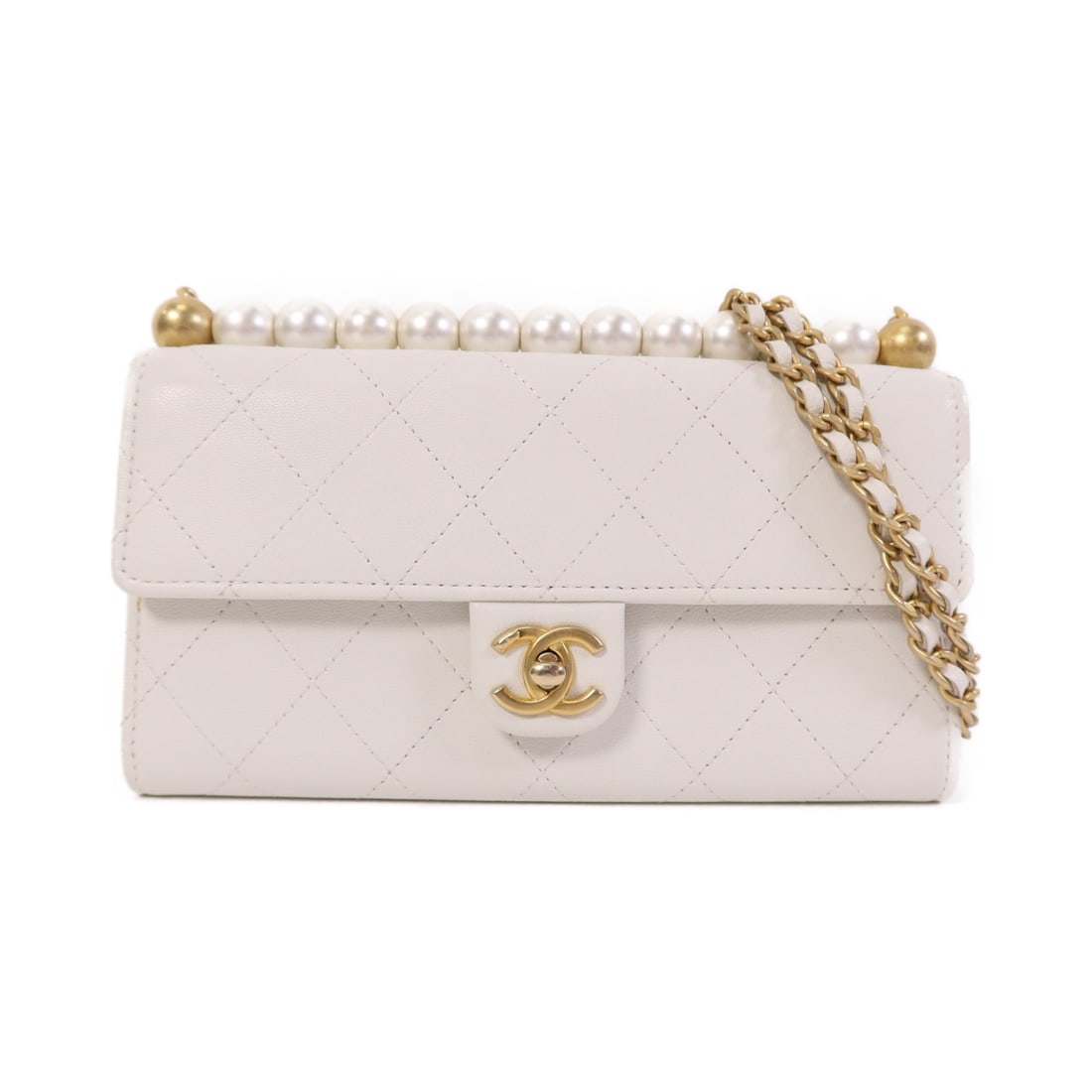 White Lambskin Chanel Wallet On Chain Shoulder Bag with CC Logo and Gold Hardware: White Lambskin Chanel Wallet On Chain Shoulder Bag with CC Logo and Gold Hardware This CHANEL Wallet On Chain (WOC) shoulder bag is crafted from luxurious white lambskin leather. Featuring a classic C