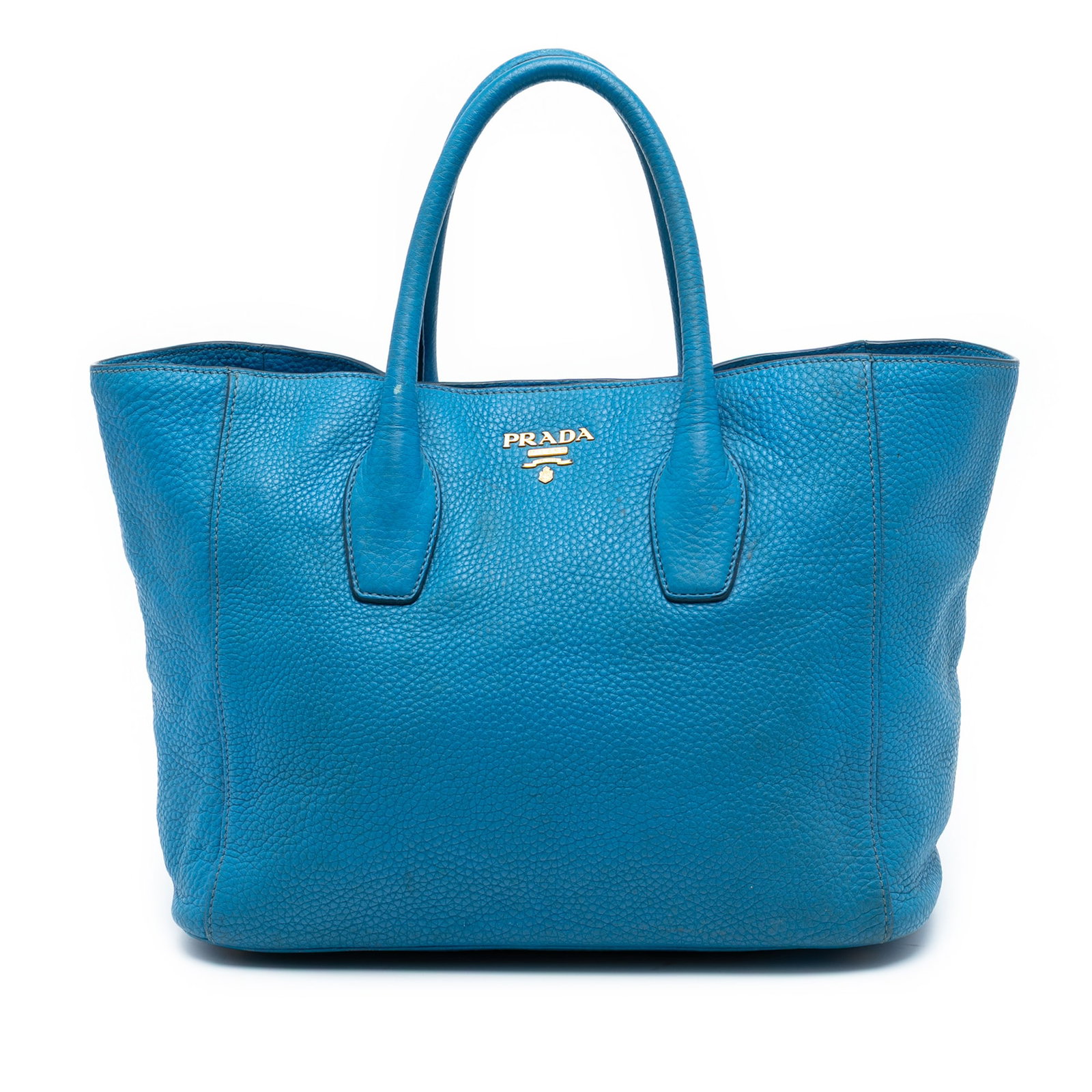 Prada Vitello Daino Blue Leather Convertible Satchel Tote Bag: Prada Vitello Daino Blue Leather Convertible Satchel Tote Bag This Prada Vitello Daino Open Convertible Tote is crafted from blue leather and features rolled leather handles, an open top with a magnet
