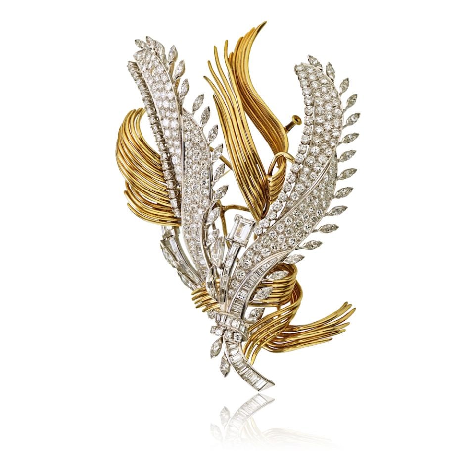 David Webb 20 Carat Diamond Convertible Brooch in Platinum and 18K Gold: David Webb 20 Carat Diamond Convertible Brooch in Platinum and 18K Gold Introducing a stunning convertible brooch by David Webb, expertly crafted in a combination of platinum and 18K yellow gold. This