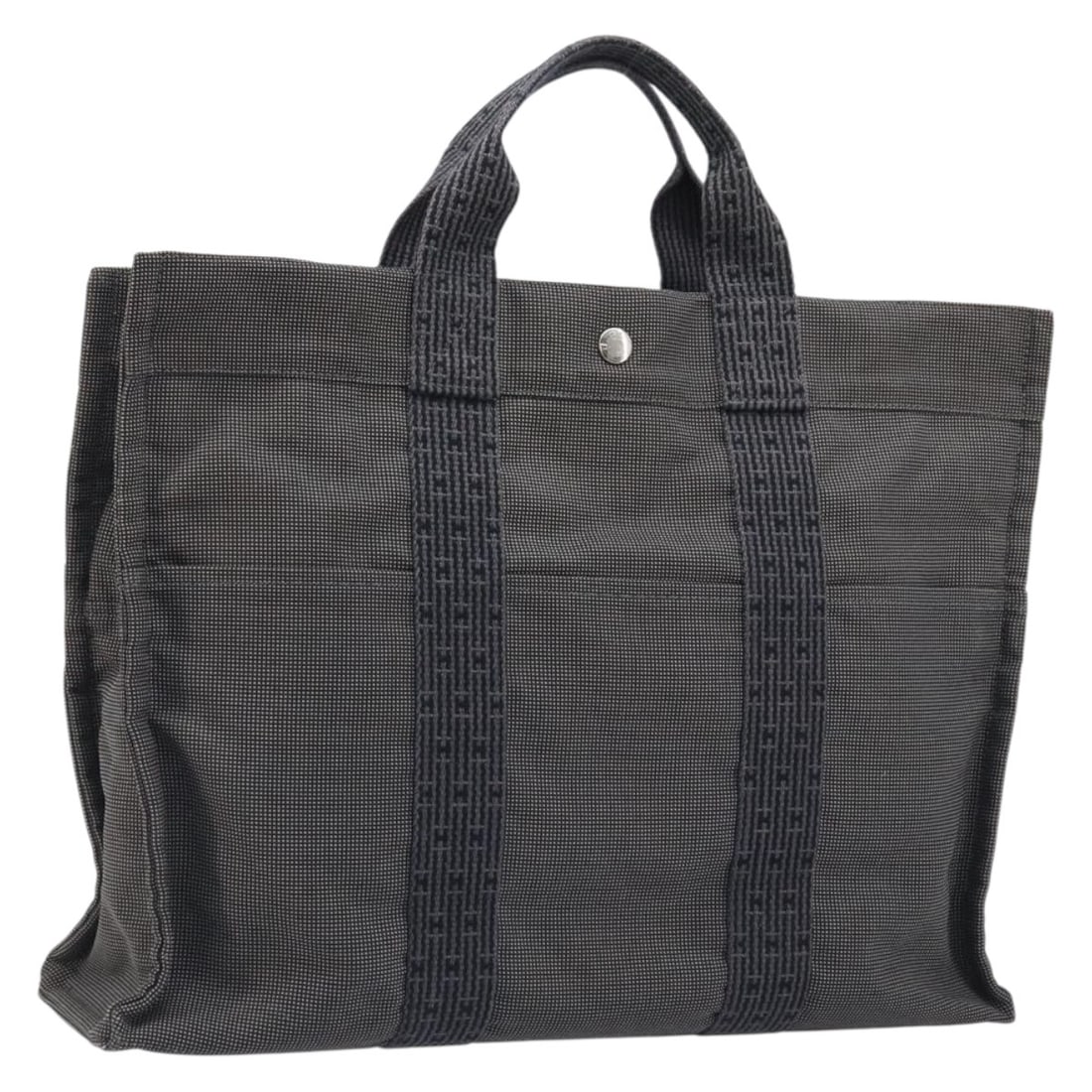 Hermes Her Line MM Gray Canvas Women's Handbag from France: Hermes Her Line MM Gray Canvas Women's Handbag from France This Hermes Her Line MM handbag is crafted from gray and silver canvas and designed for women. The bag features a spacious interior, sturdy h