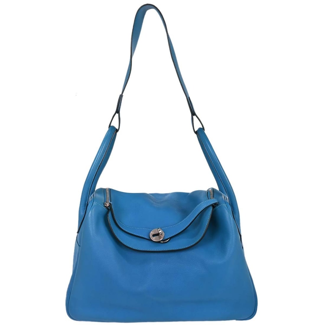 Hermes Blue Zanzibar Lindy 34 Leather Shoulder Bag: Hermes Blue Zanzibar Lindy 34 Leather Shoulder Bag Introducing the Hermes Blue Zanzibar Evercolor Lindy 34 Shoulder Bag, a perfect blend of style and functionality for casual occasions. This medium-si