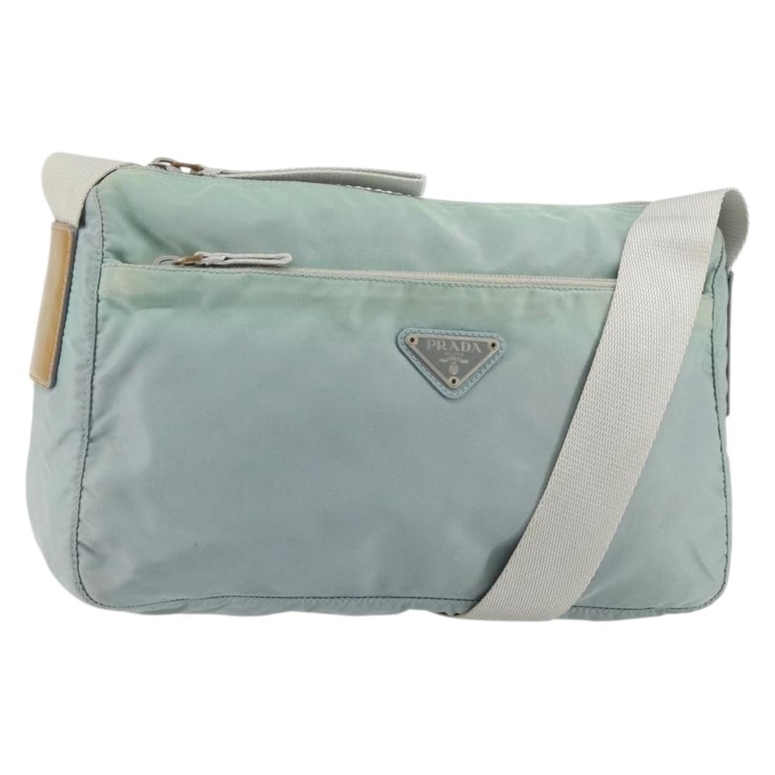 Prada green nylon shoulder bag silver trim Italy: Prada green nylon shoulder bag silver trim Italy This PRADA shoulder bag is crafted from green nylon with silver-tone accents. Designed for women, it features an adjustable shoulder strap and is made 