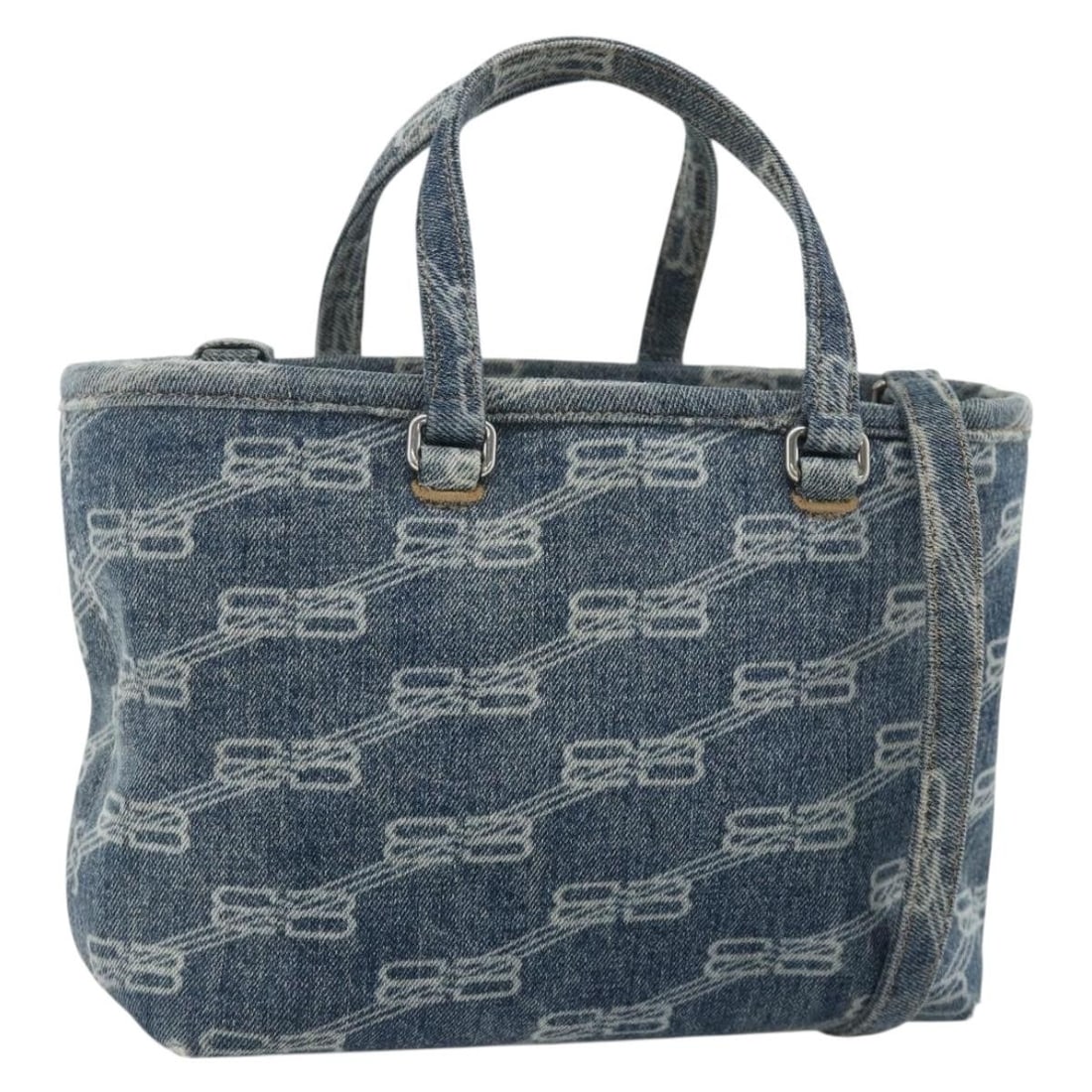 Balenciaga BB Monogram Canvas Blue Silver 2way Hand Bag: Balenciaga BB Monogram Canvas Blue Silver 2way Hand Bag This BALENCIAGA BB Monogram 2-way hand bag features a blue and silver canvas exterior with the brand's signature monogram pattern. Designed for 