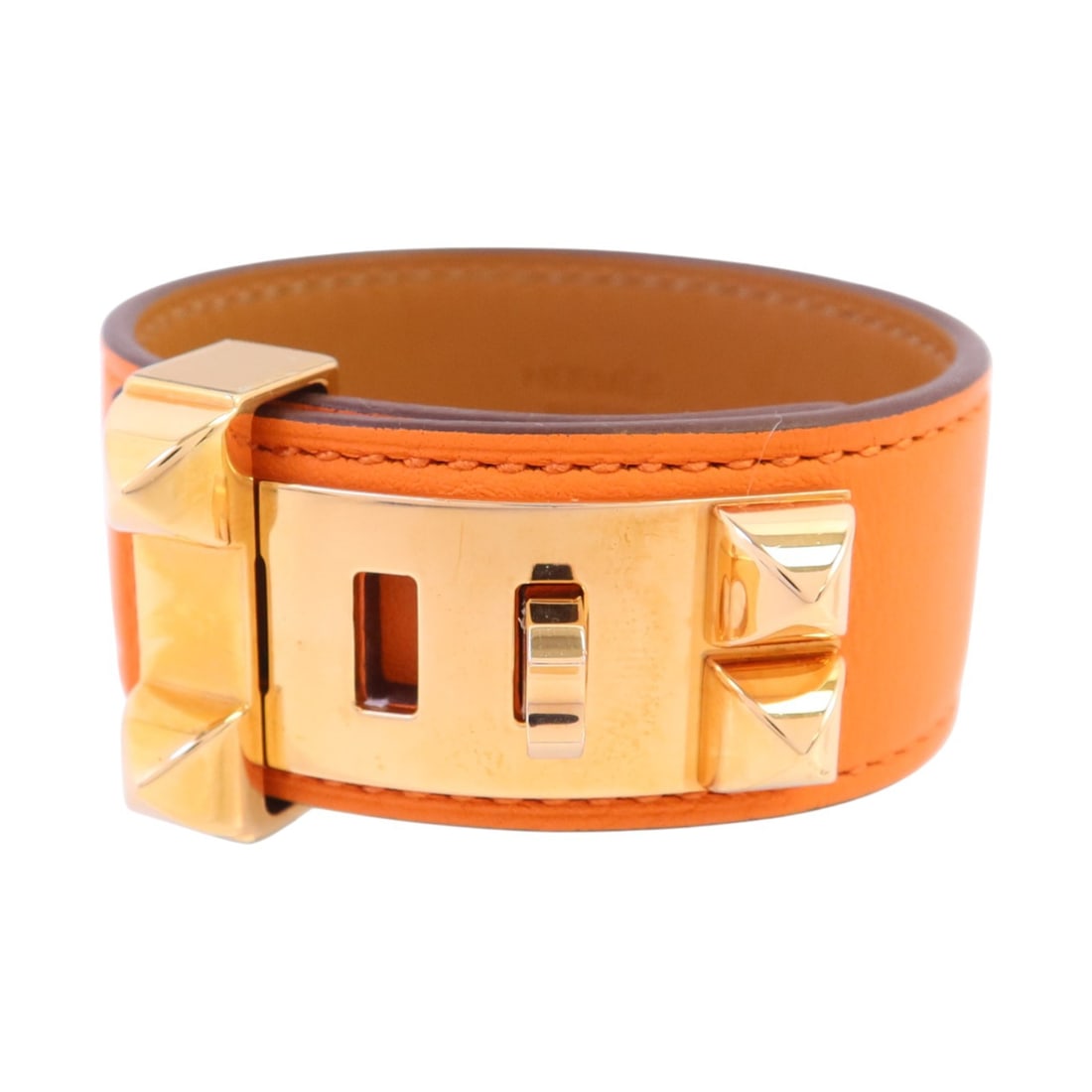 Hermes Collier De Chien 24 Orange Swift Leather Gold Hardware Bracelet: Hermes Collier De Chien 24 Orange Swift Leather Gold Hardware Bracelet This Hermes Collier De Chien 24 bracelet features premium orange Swift leather in a classic bangle design. The bracelet is crafte
