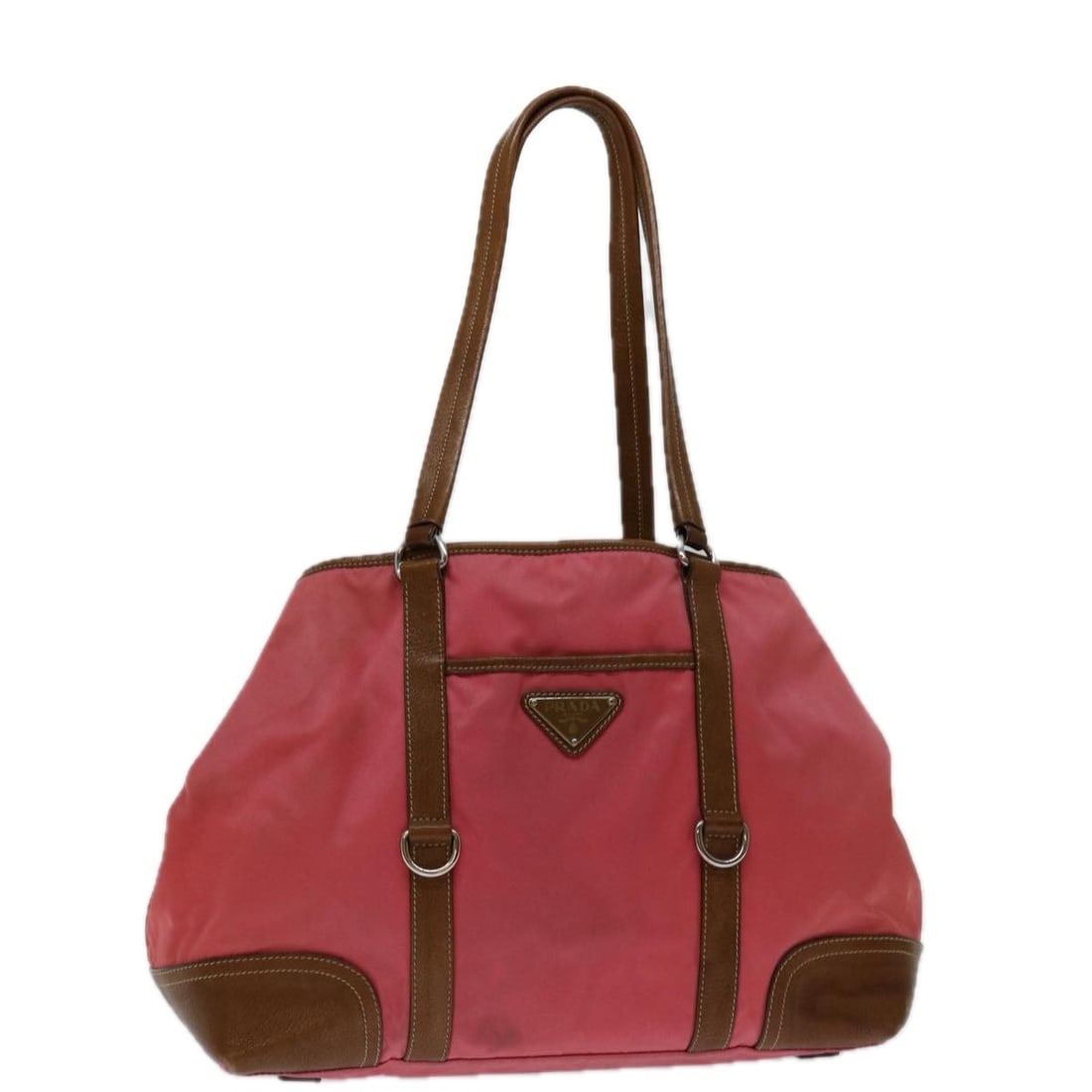 Prada Pink Nylon Tote Bag Italy 12.6 x 9.1 x 4.7 inch: Prada Pink Nylon Tote Bag Italy 12.6 x 9.1 x 4.7 inch This PRADA tote bag is crafted from pink nylon and designed for women. Made in Italy, it features a spacious interior suitable for daily use. The 