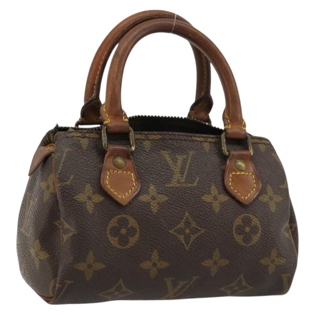 Louis Vuitton Monogram Canvas Mini Speedy M41534 Handbag: Louis Vuitton Monogram Canvas Mini Speedy M41534 Handbag This Louis Vuitton Monogram Mini Speedy Hand Bag is crafted from signature Monogram Canvas and was made in France. The bag features a compact d